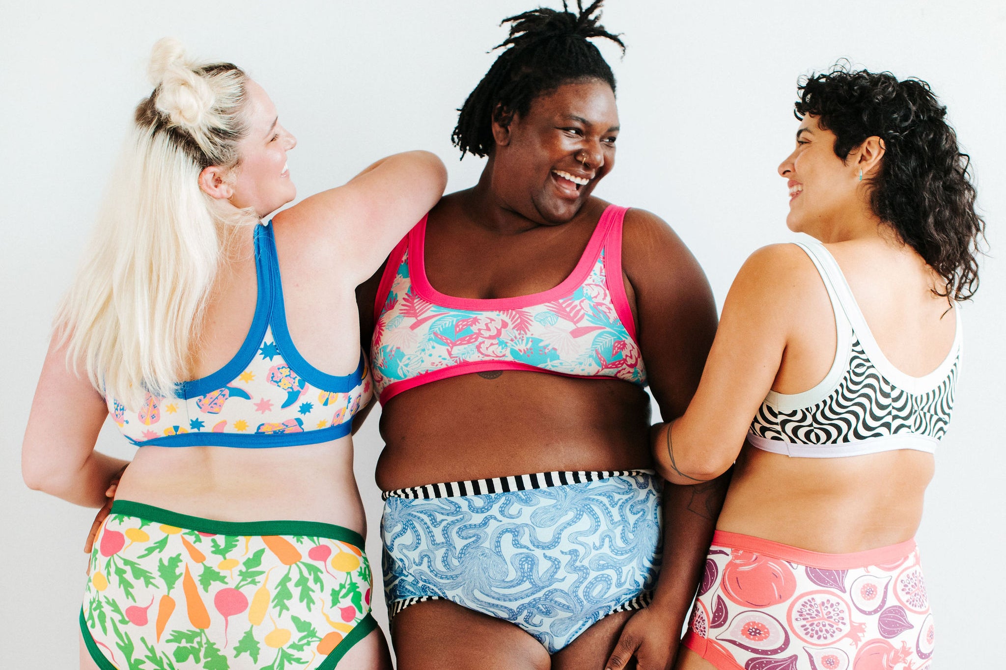 Three models wearing Thunderpants underwear and bras in various styles and prints.