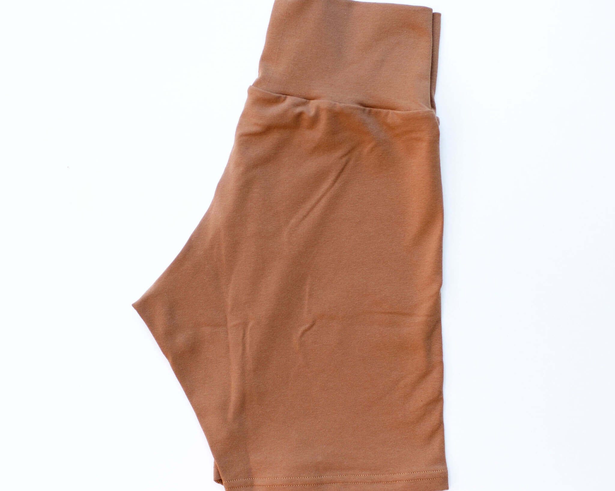 Flat lay of Thunderpants Bike Shorts Hazelnut color - a mid-brown/tan.