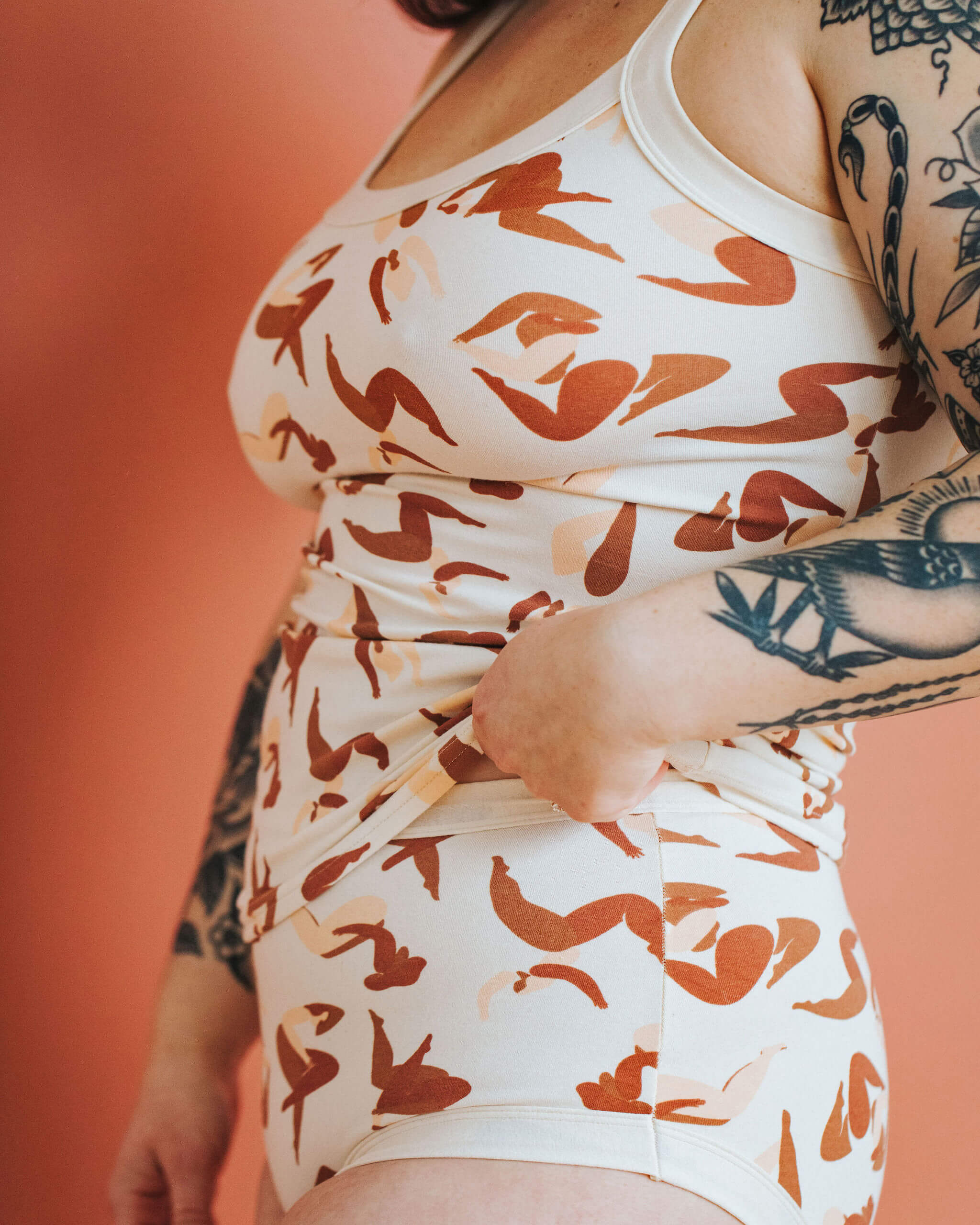 Close up of model wearing Thunderpants Camisole and Hipster style underwear in Bodies in Motion print.