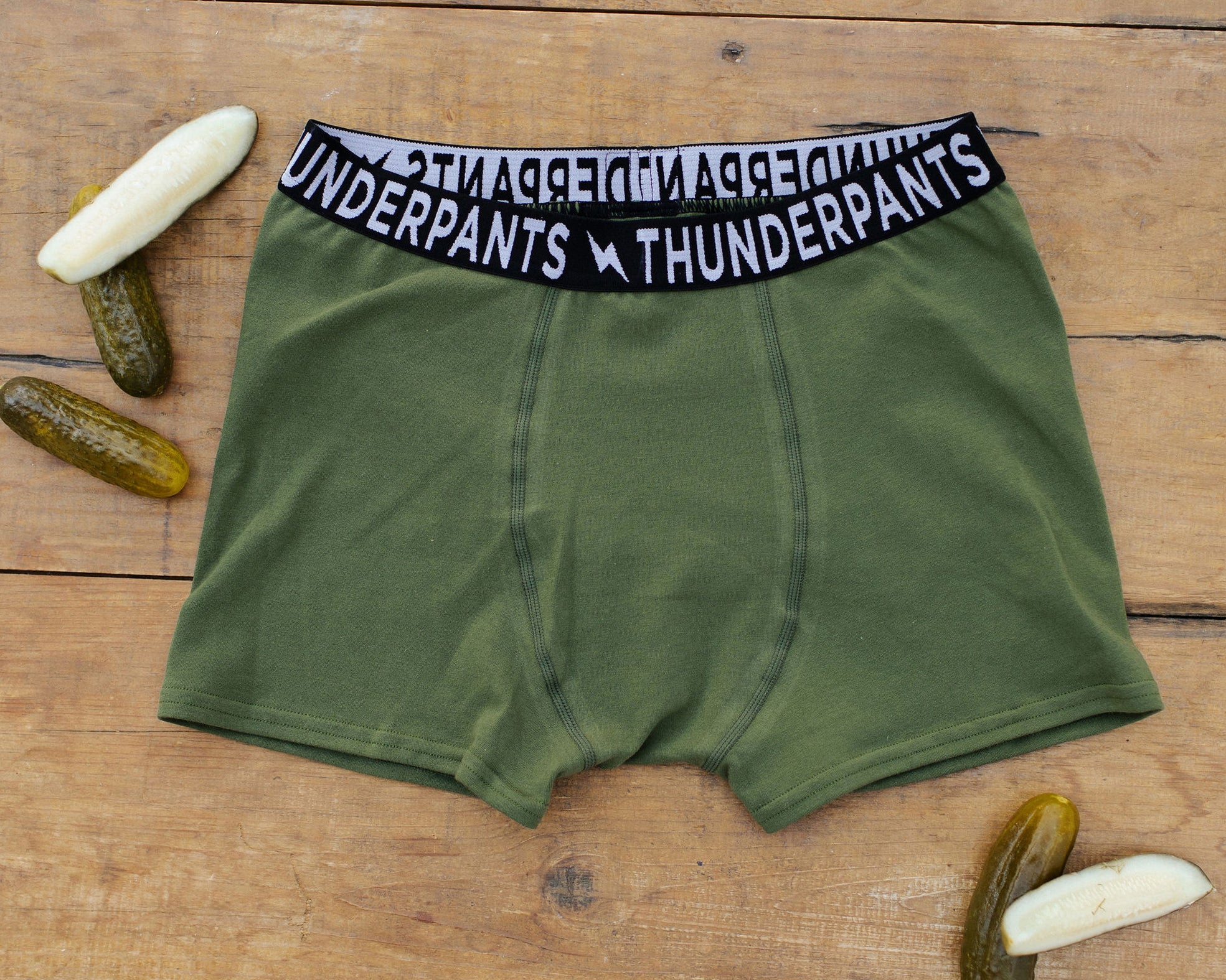 Flat lay of Thunderpants Boxer Brief style underwear in Pickled Green.