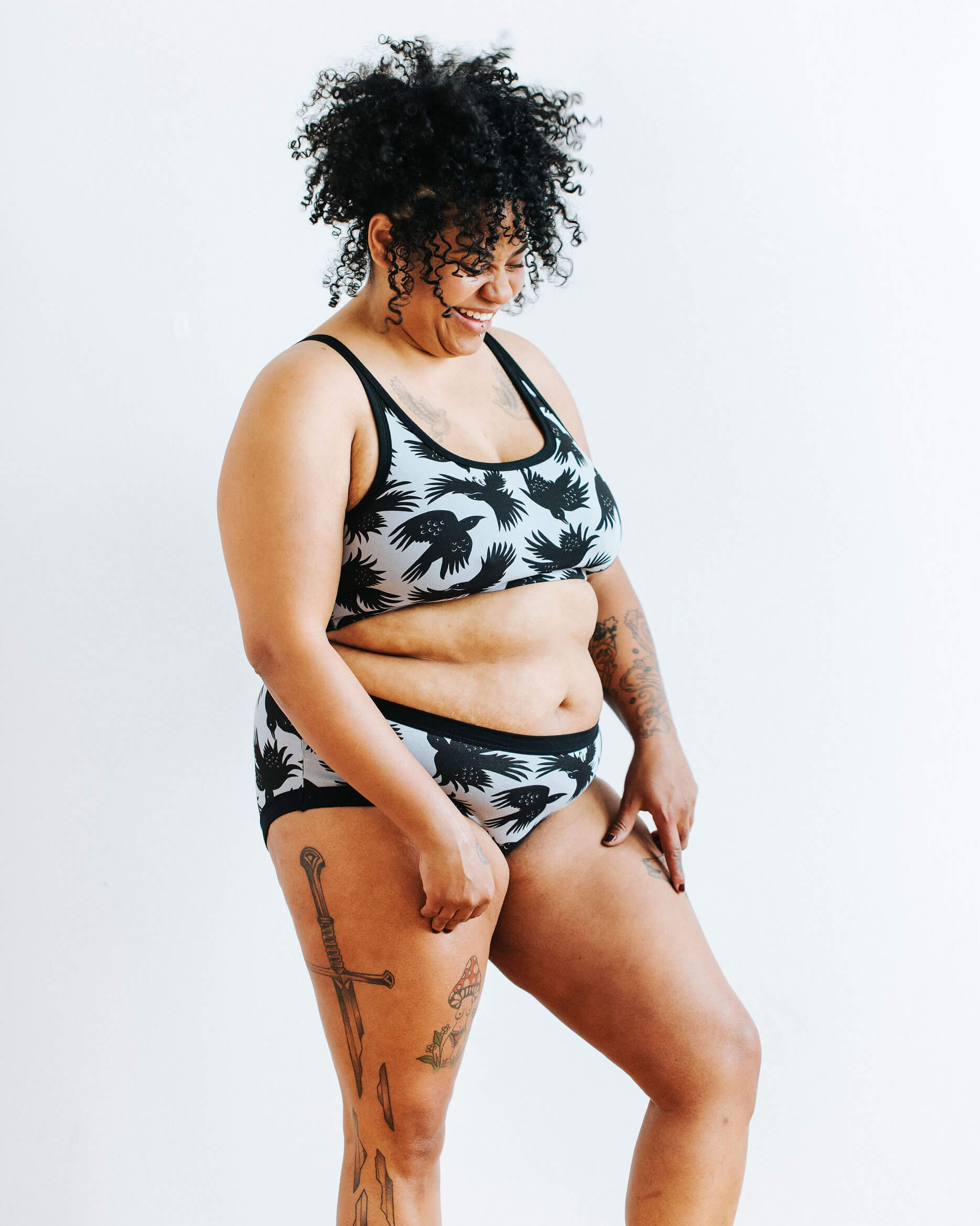 Model wearing Thunderpants Hipster style underwear and Longline Bra in So it Crows - black crows on grey.