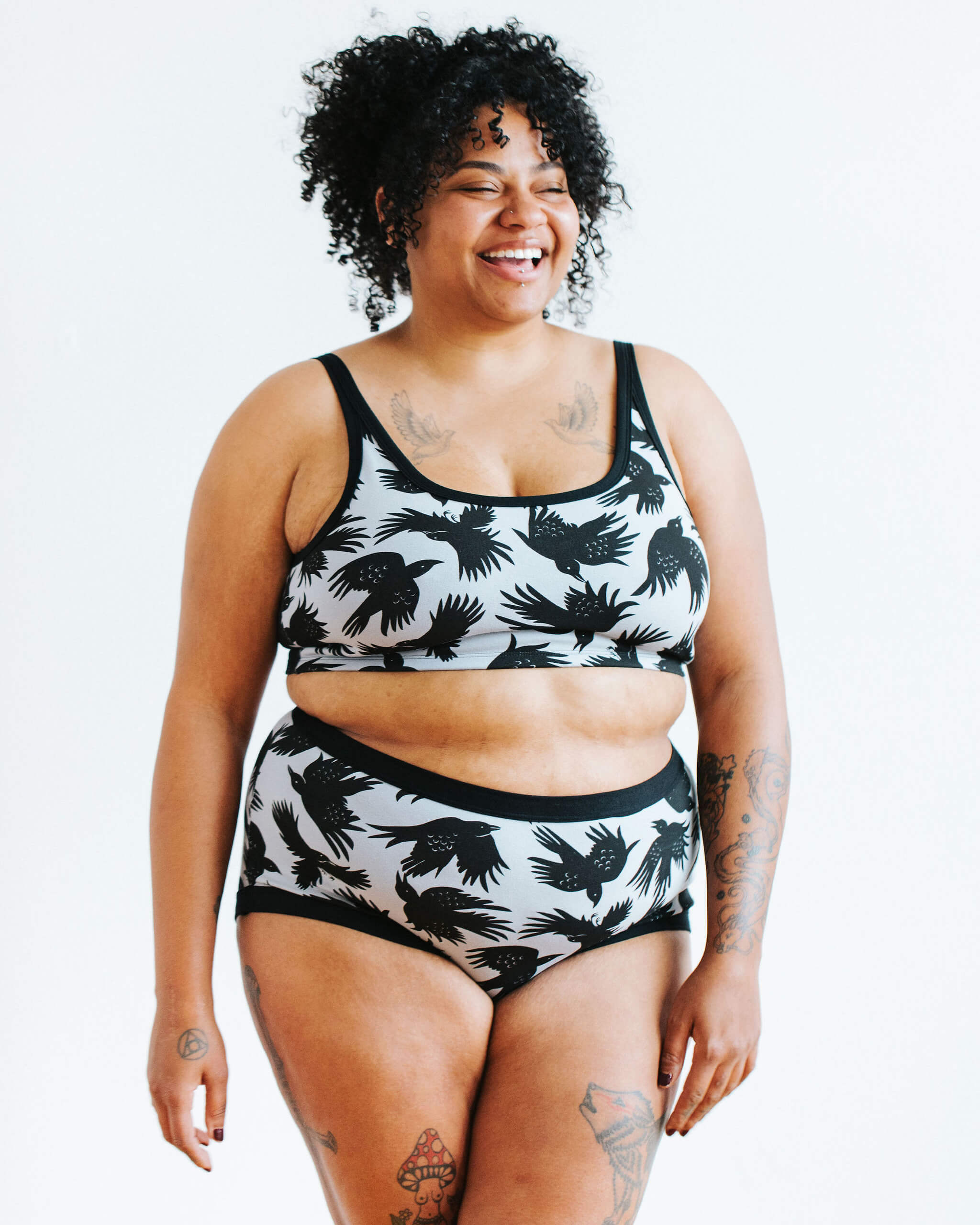 Model wearing Thunderpants Original style underwear and Longline Bra in So it Crows - black crows on grey.