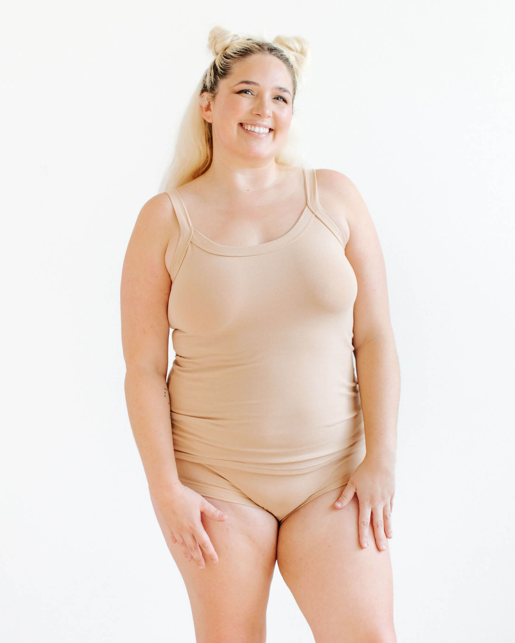 Model wearing Thunderpants Hipster style underwear and Camisole in Pine Nut - lighter tan color.