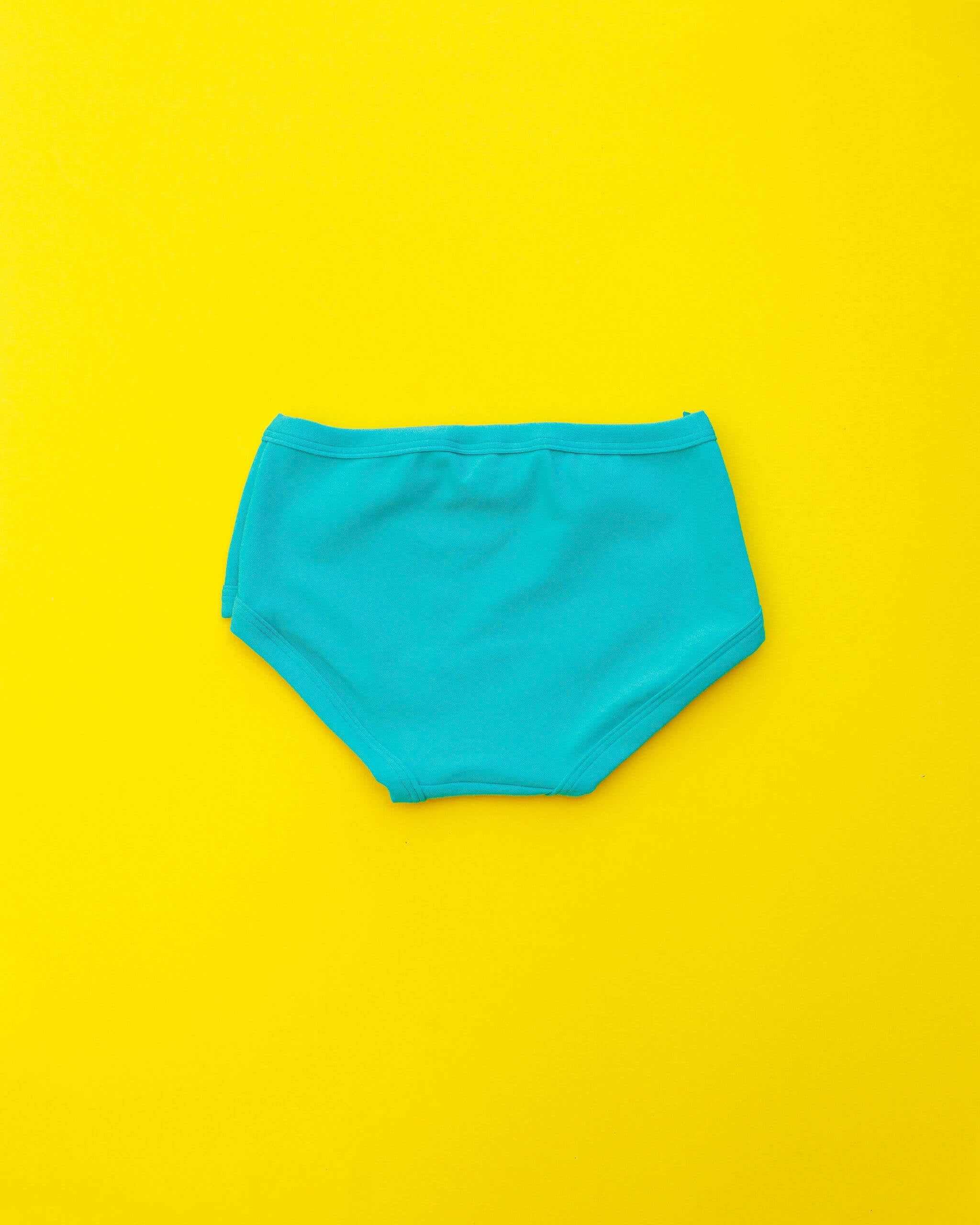 Flat lay of Thunderpants Kid's style underwear in Peacock Green.