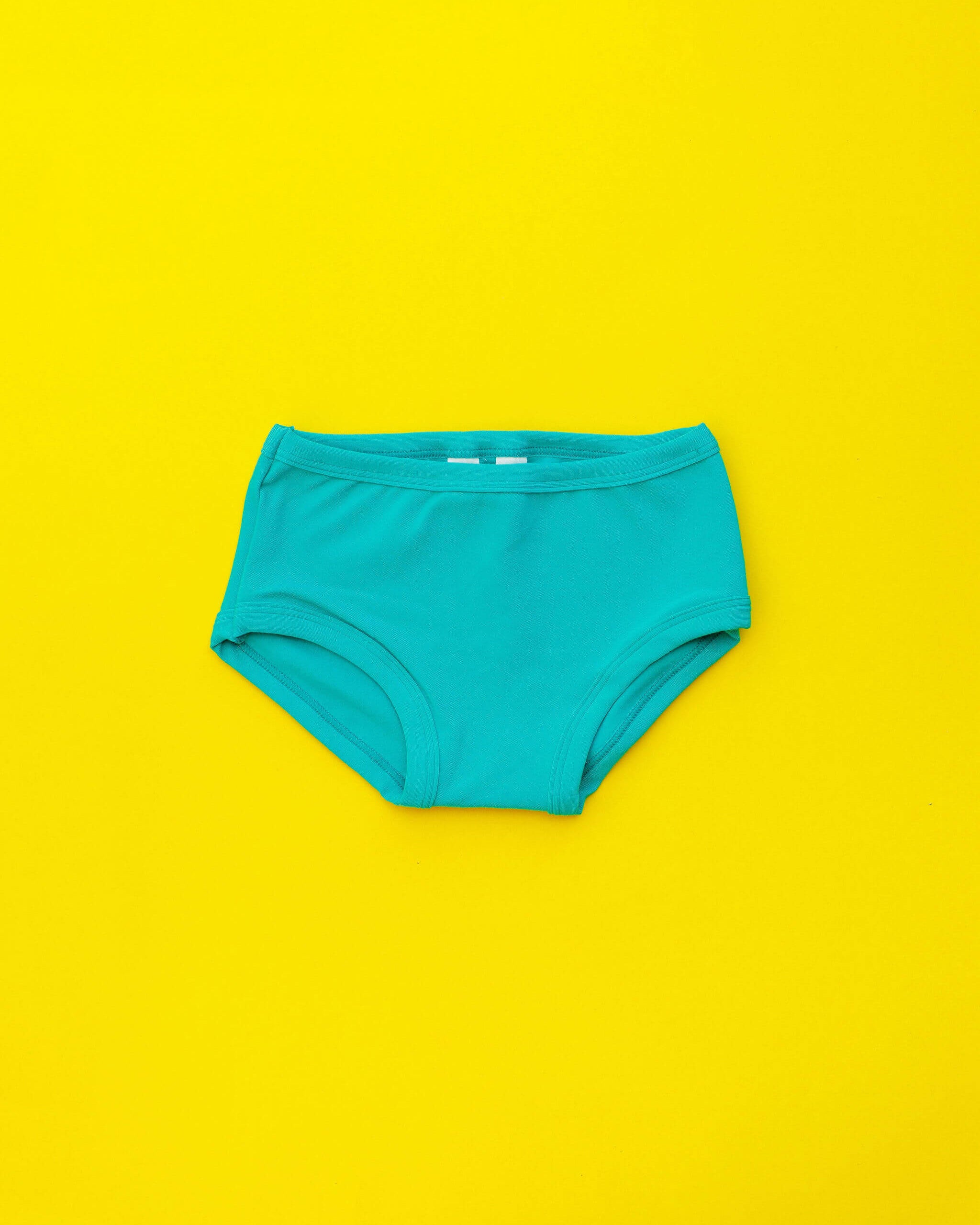 Flat lay of Thunderpants Kid's style underwear in Peacock Green.