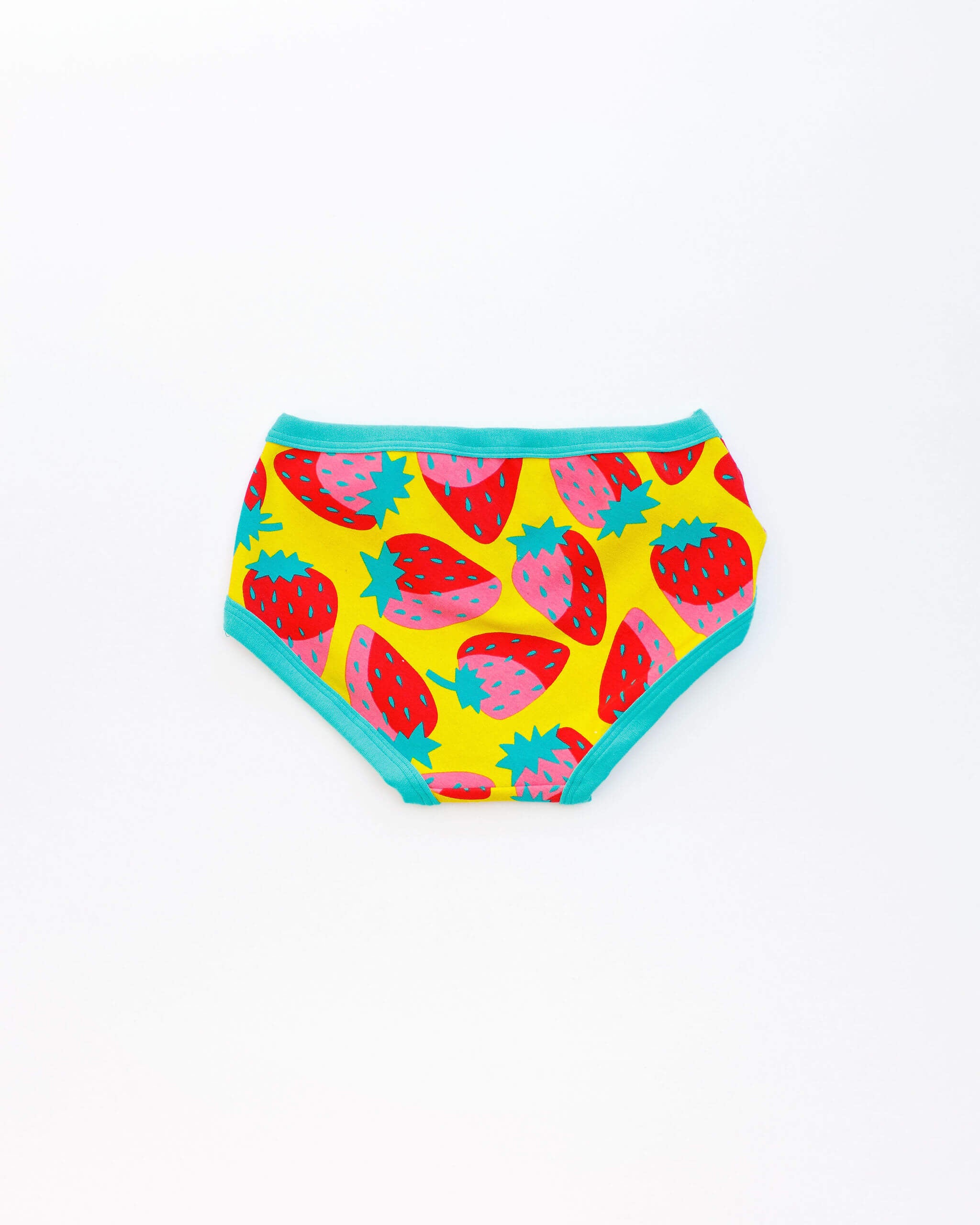 Flat lay of Thunderpants Kid's style underwear in Strictly Strawberry - pink, red, and green strawberries.