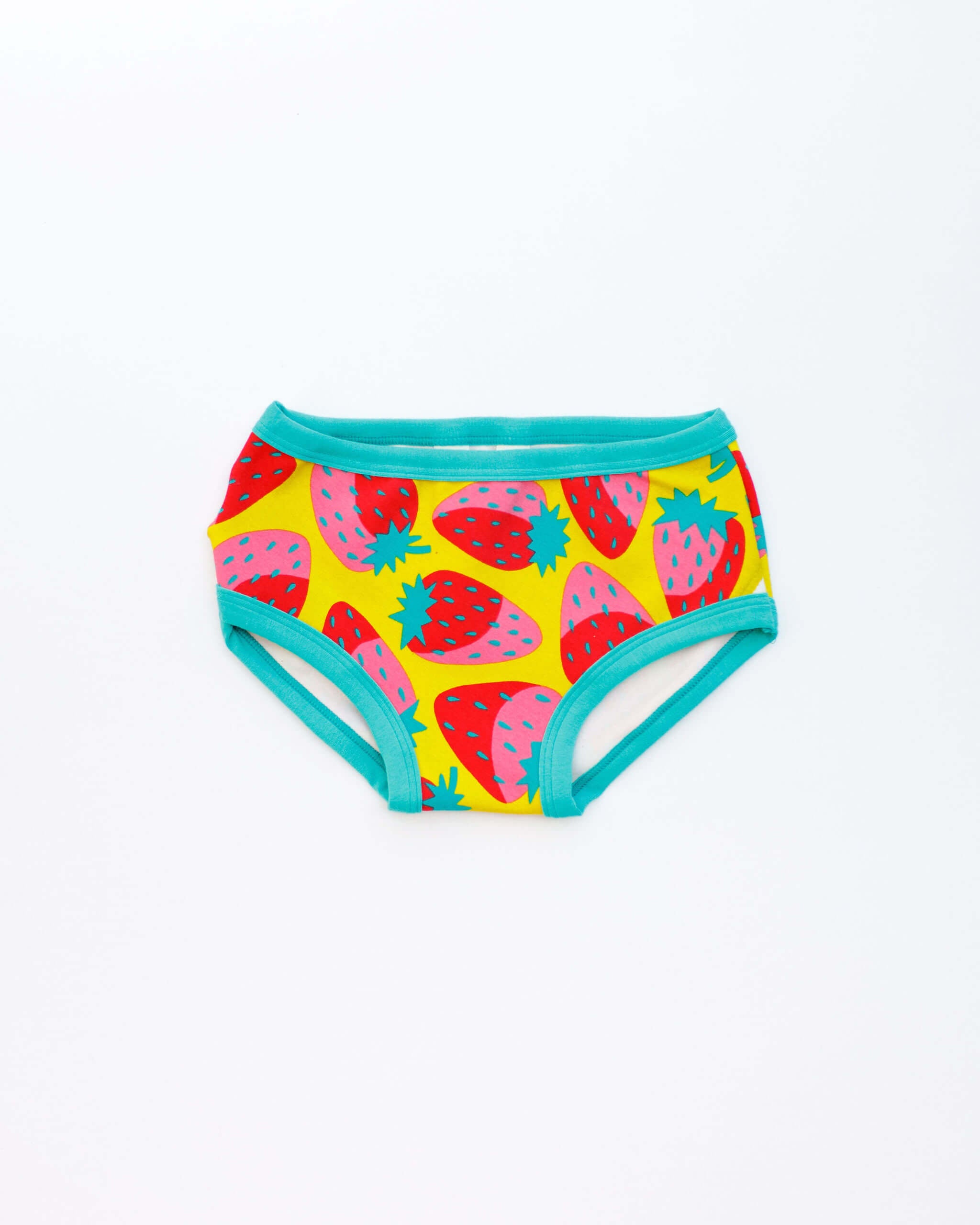 Flat lay of Thunderpants Kid's style underwear in Strictly Strawberry - pink, red, and green strawberries.