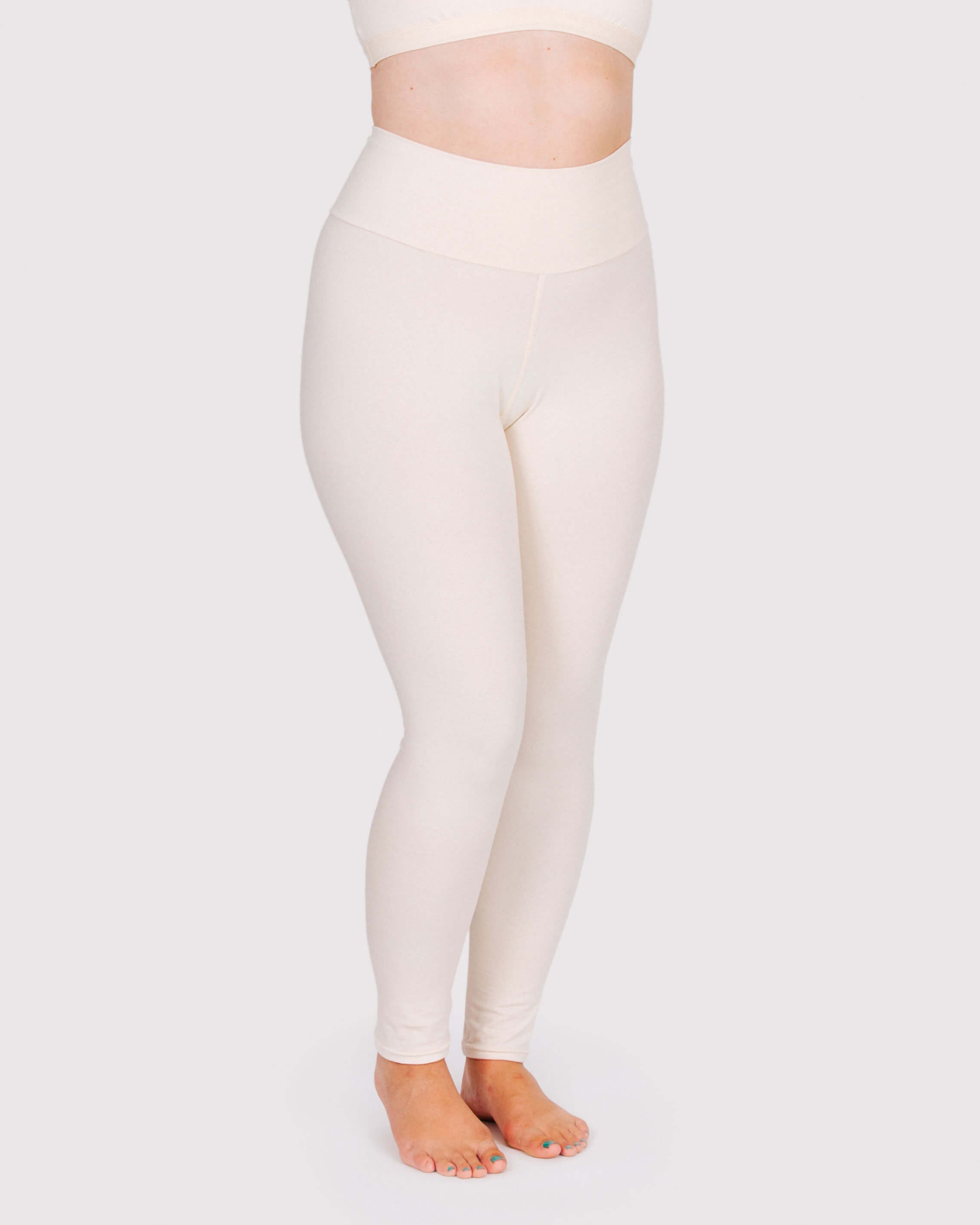 Fit photo from the front of Thunderpants organic cotton Leggings in off-white on a model.
