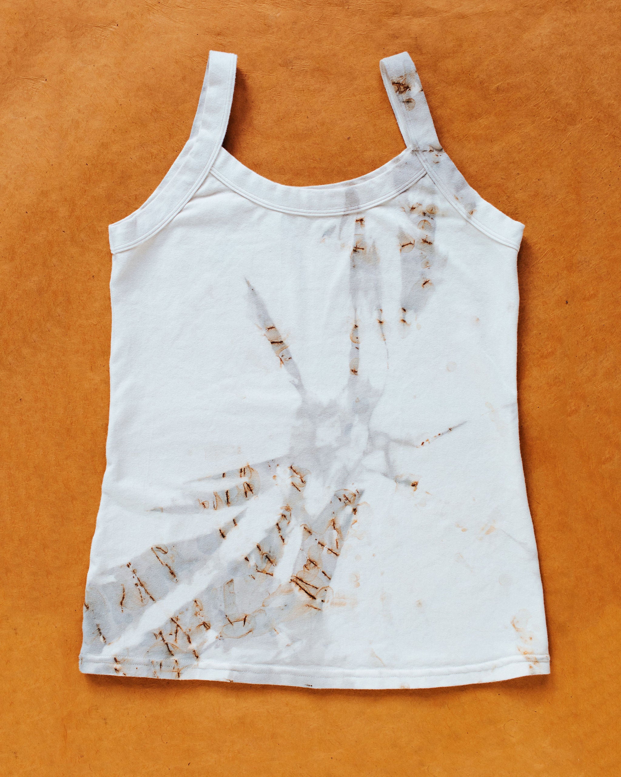 Flat lay of Thunderpants Camisole in Mineral Rust Hand Dye.