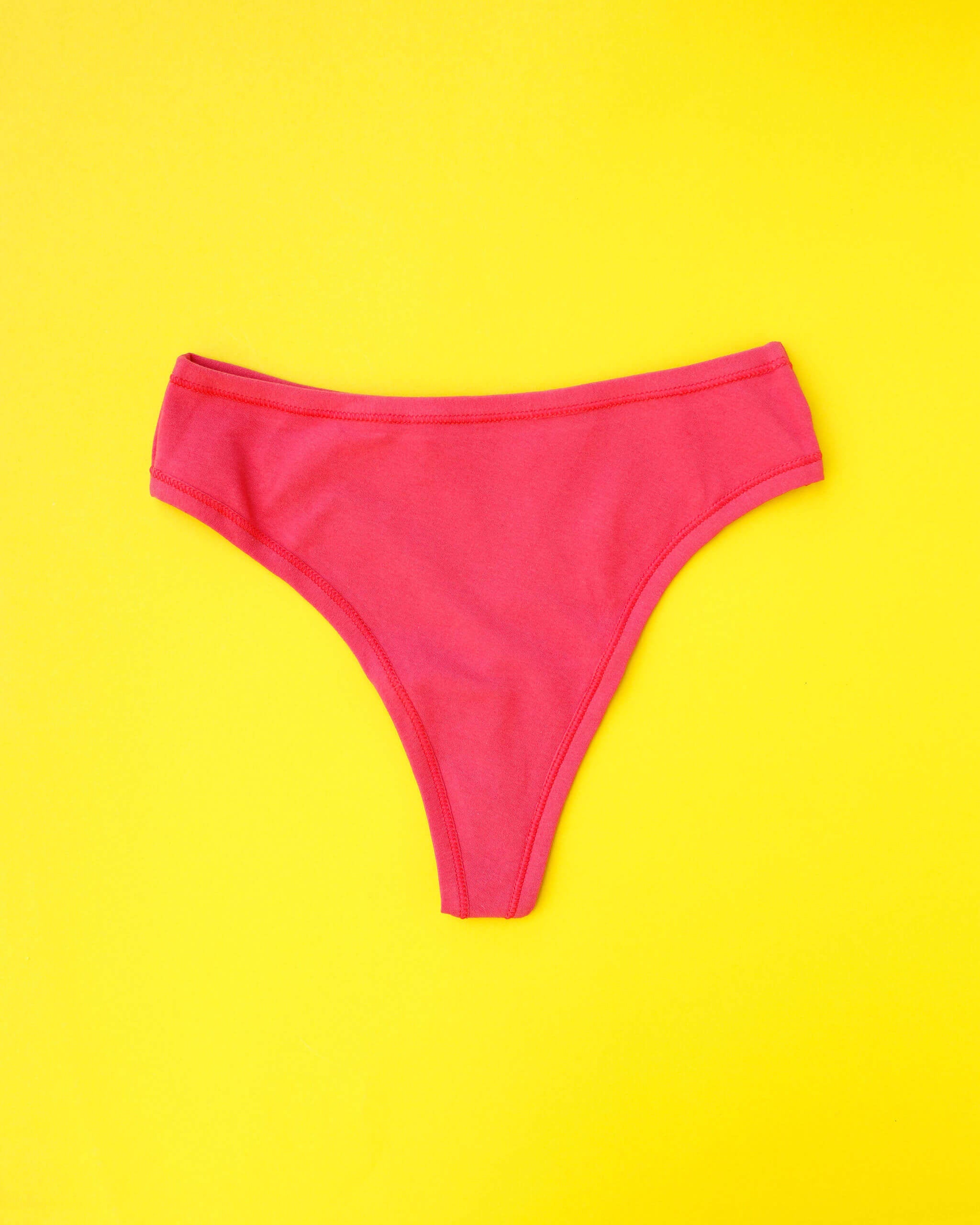 Flat lay of Thunderpants Thunder Thong style in Pomegranate Punch.
