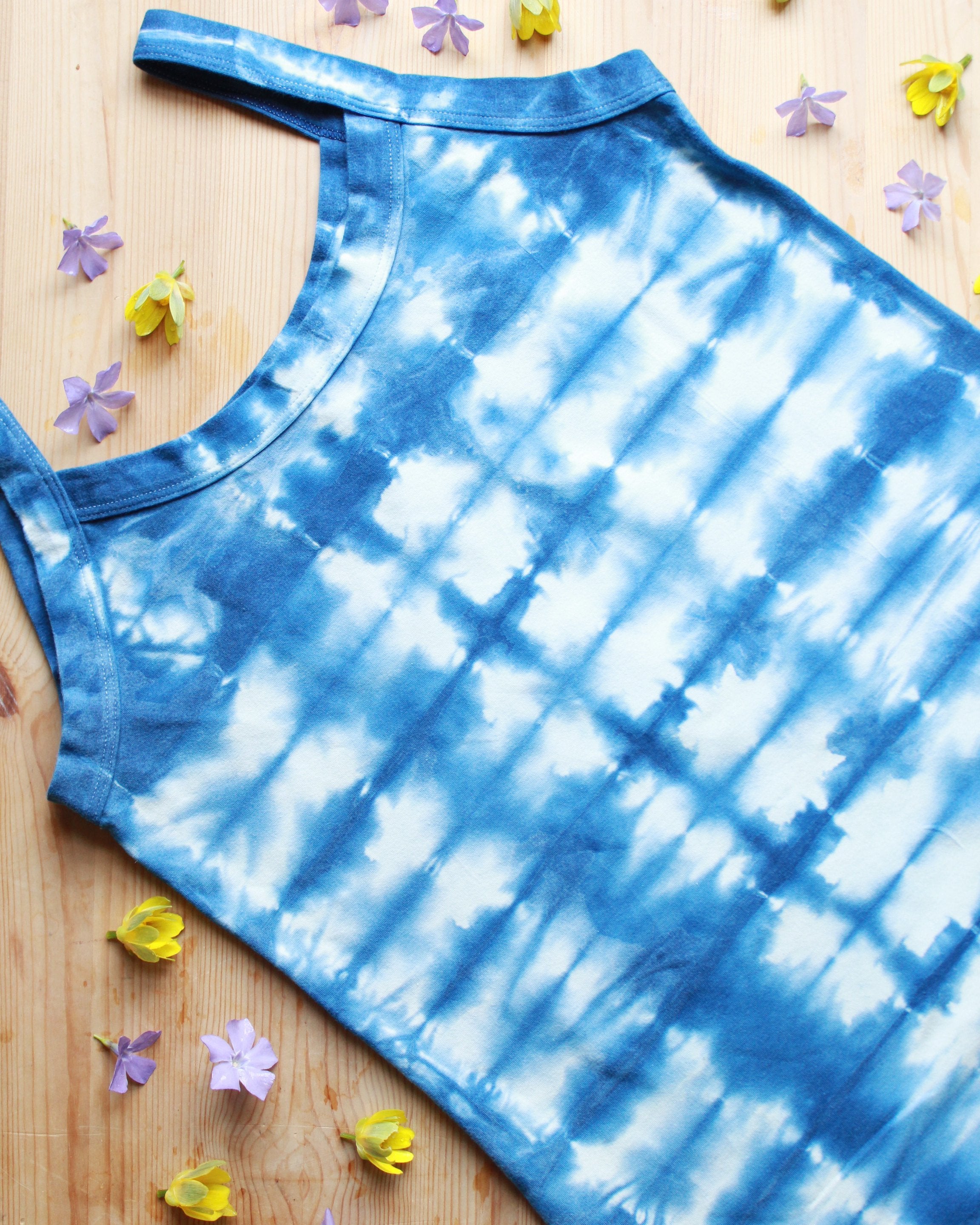 Close-up flat-lay of Thunderpants organic cotton Camisole in limited edition hand dyed indigo shibori tie dye.