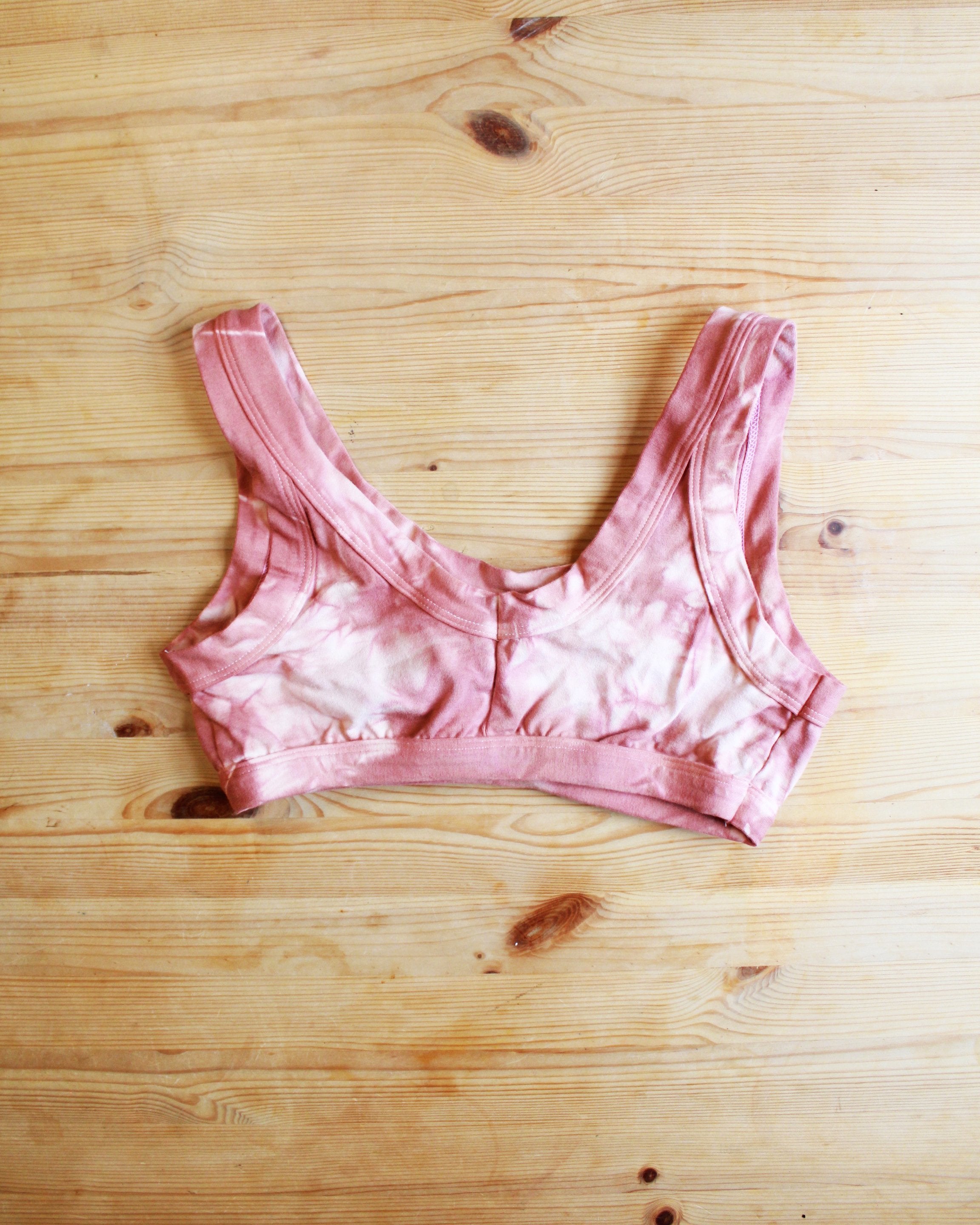 Flat-lay back of Thunderpants organic cotton Bralette in limited edition hand dyed pink shibori tie dye.
