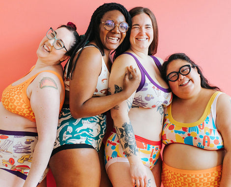 Four models smiling wearing various prints and styles of Thunderpants underwear and Bralettes.