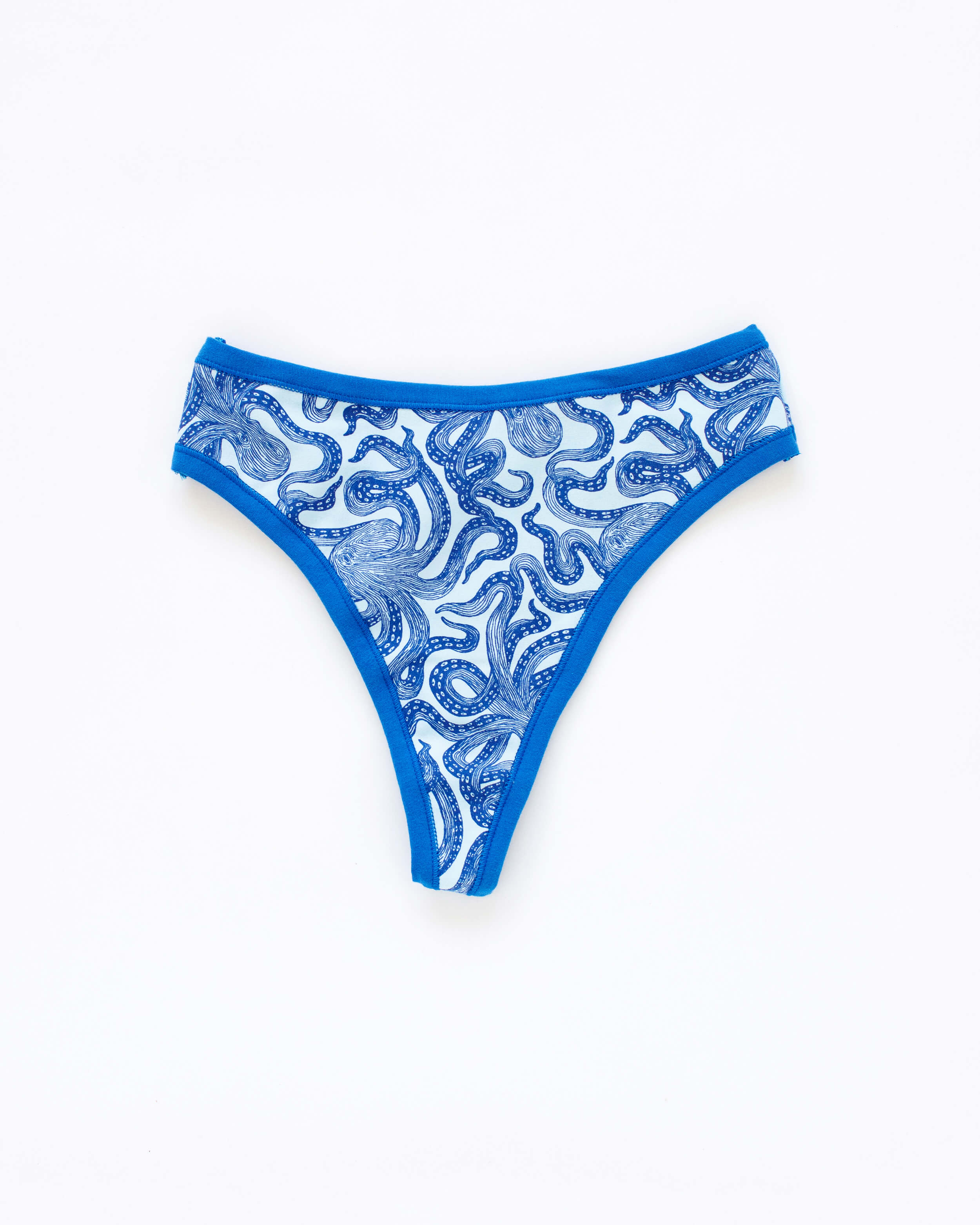 Flat lay of Thunderpants Thong style underwear in Octo-Pants print.