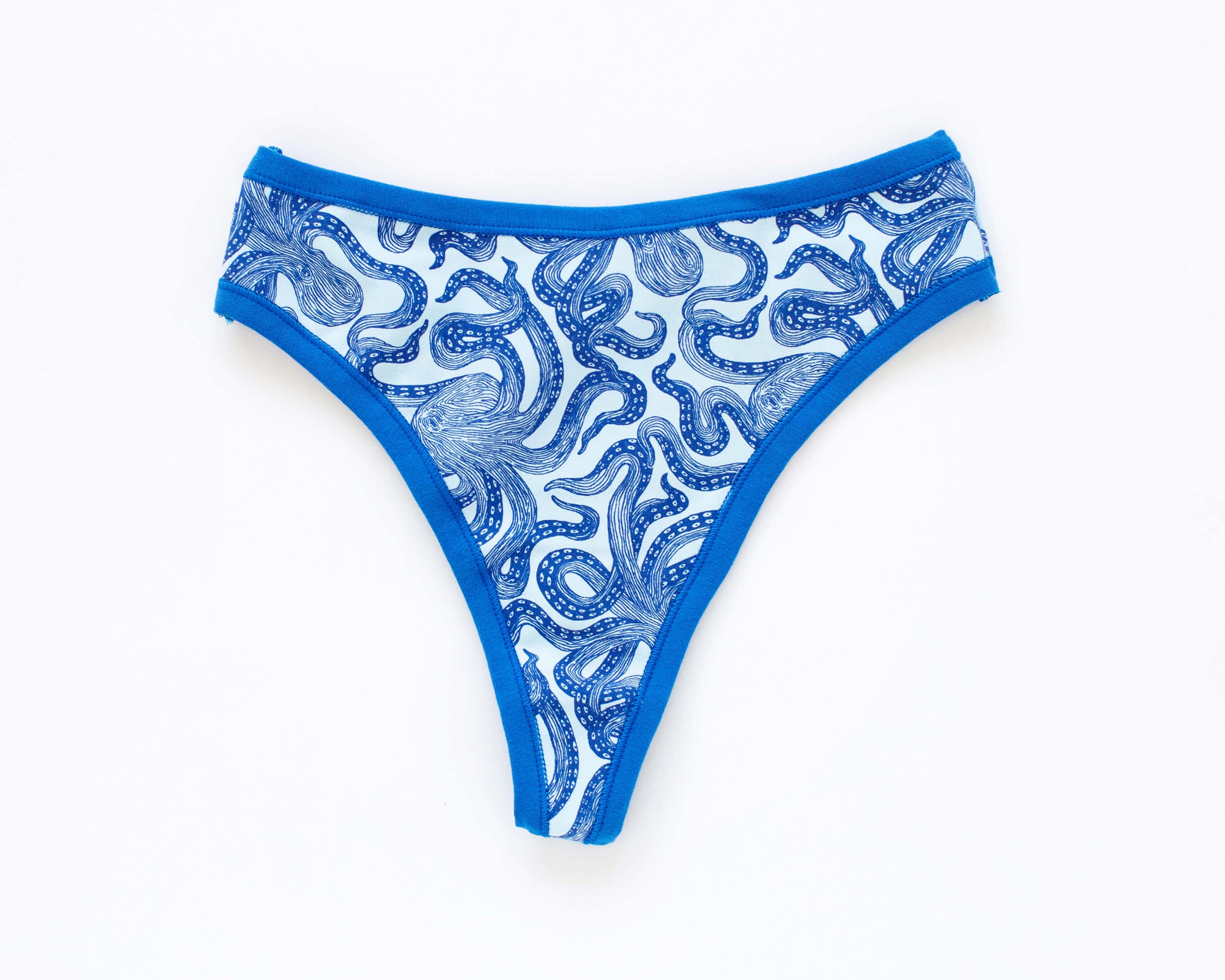 Flat lay of Thunderpants Thong style underwear in Octo-Pants print.