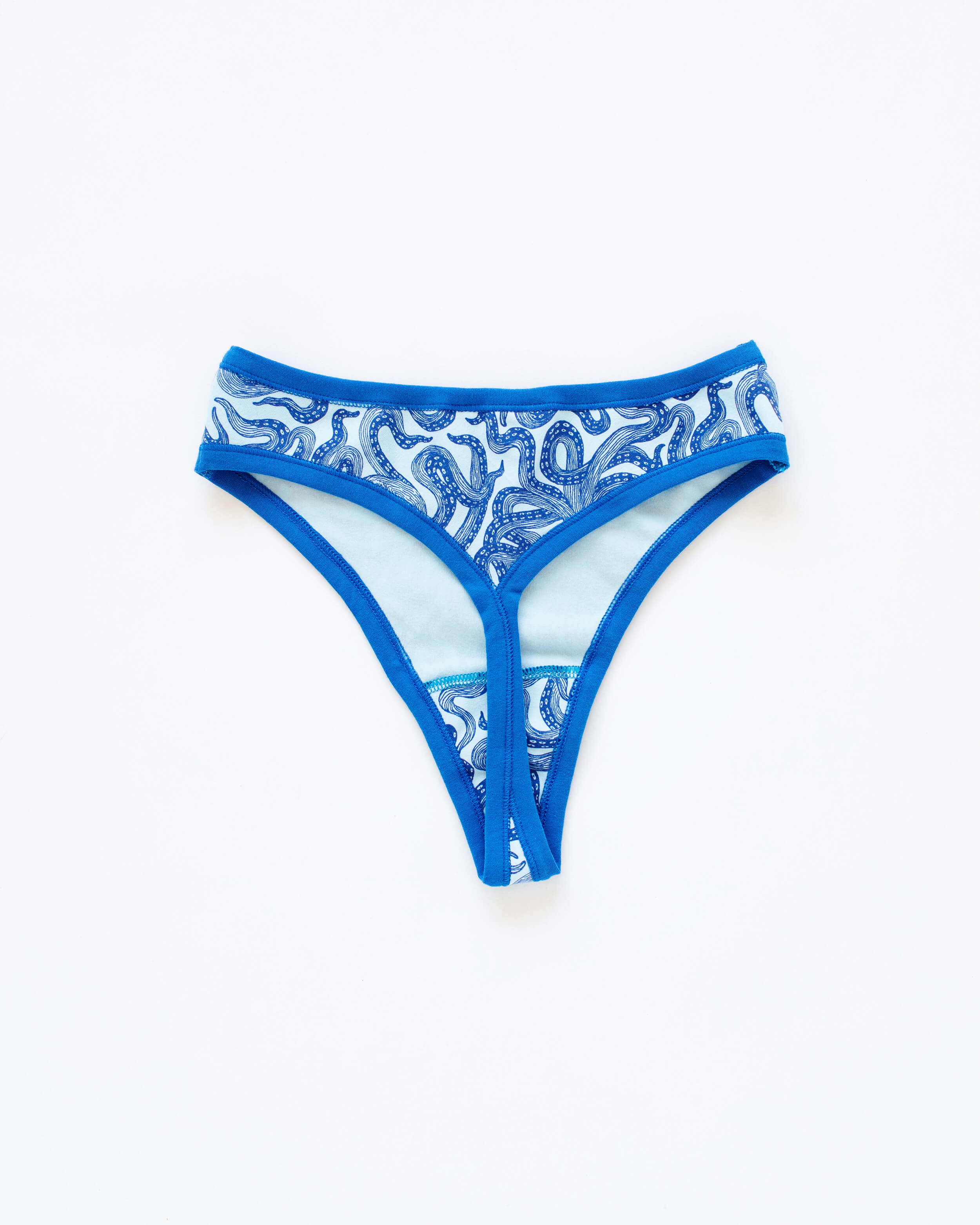 Flat lay of Thunderpants Thong style underwear in Octo-Pants print.