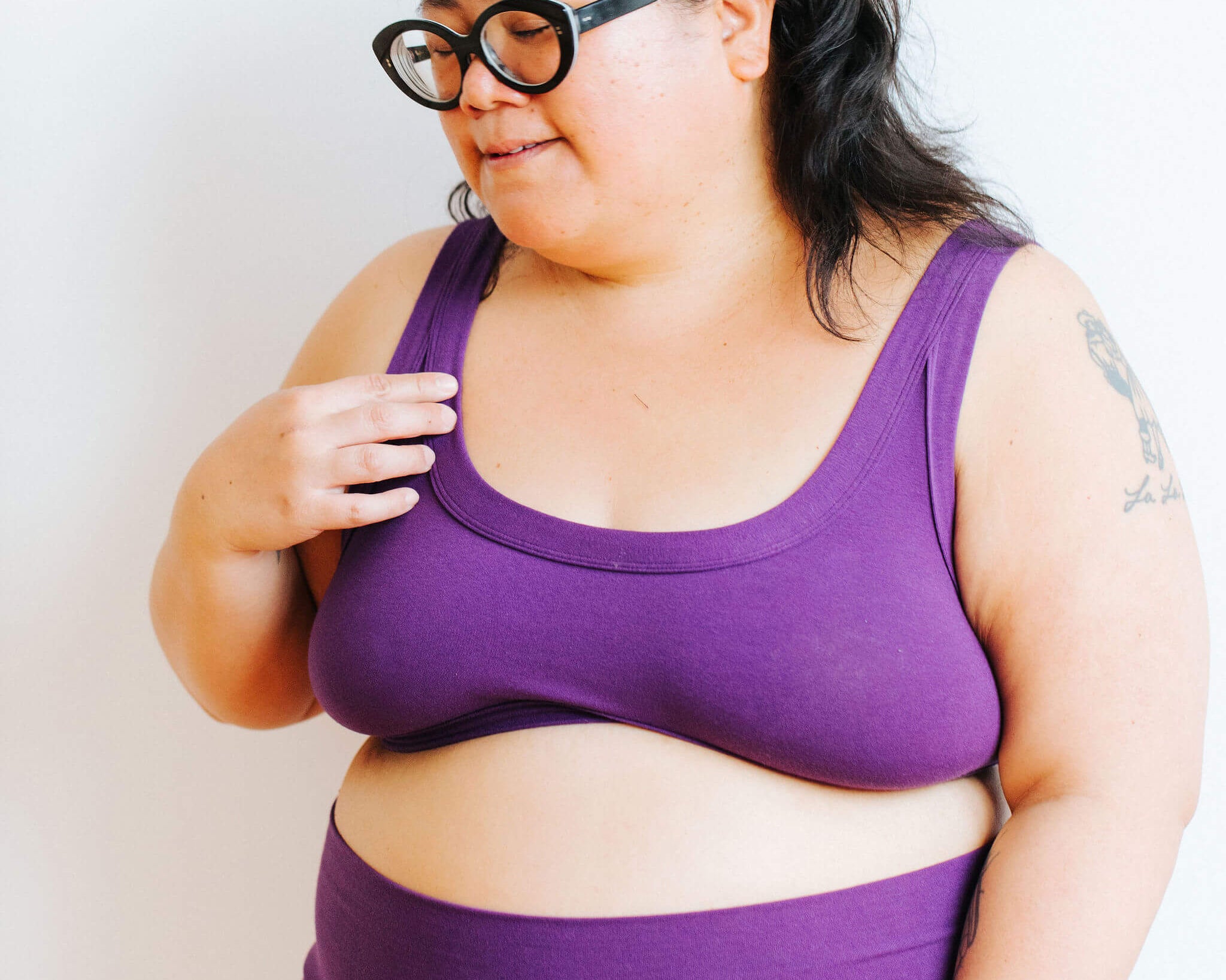 Model wearing Thunderpants Bralette and Bike Shorts in Amethyst color. 