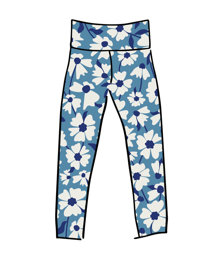 Model wearing Thunderpants Ankle Leggings and Camisole in Moody Blooms - white and blue flowers with blue background.