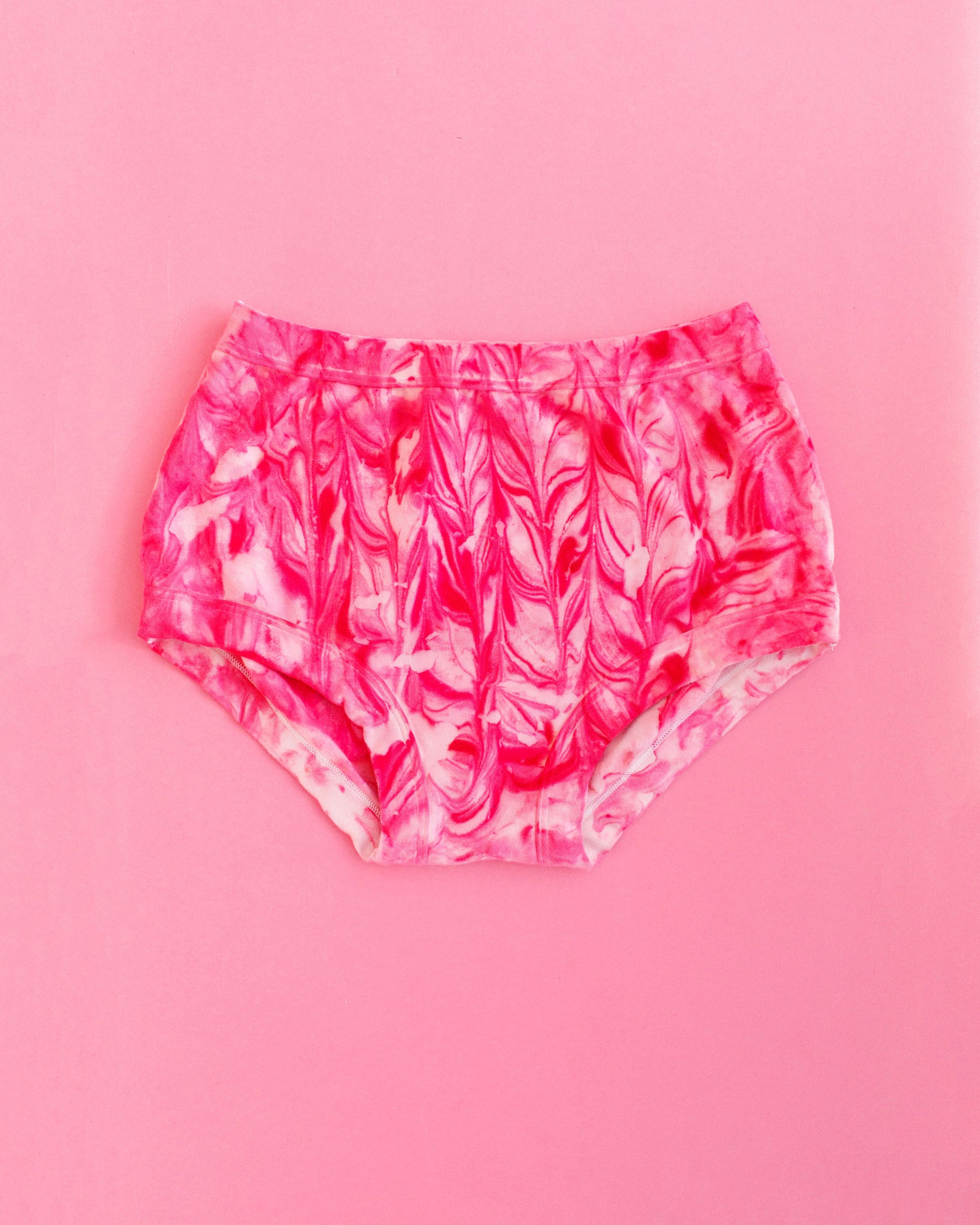 One pair of Thunderpants Original style underwear in pink marble dye.