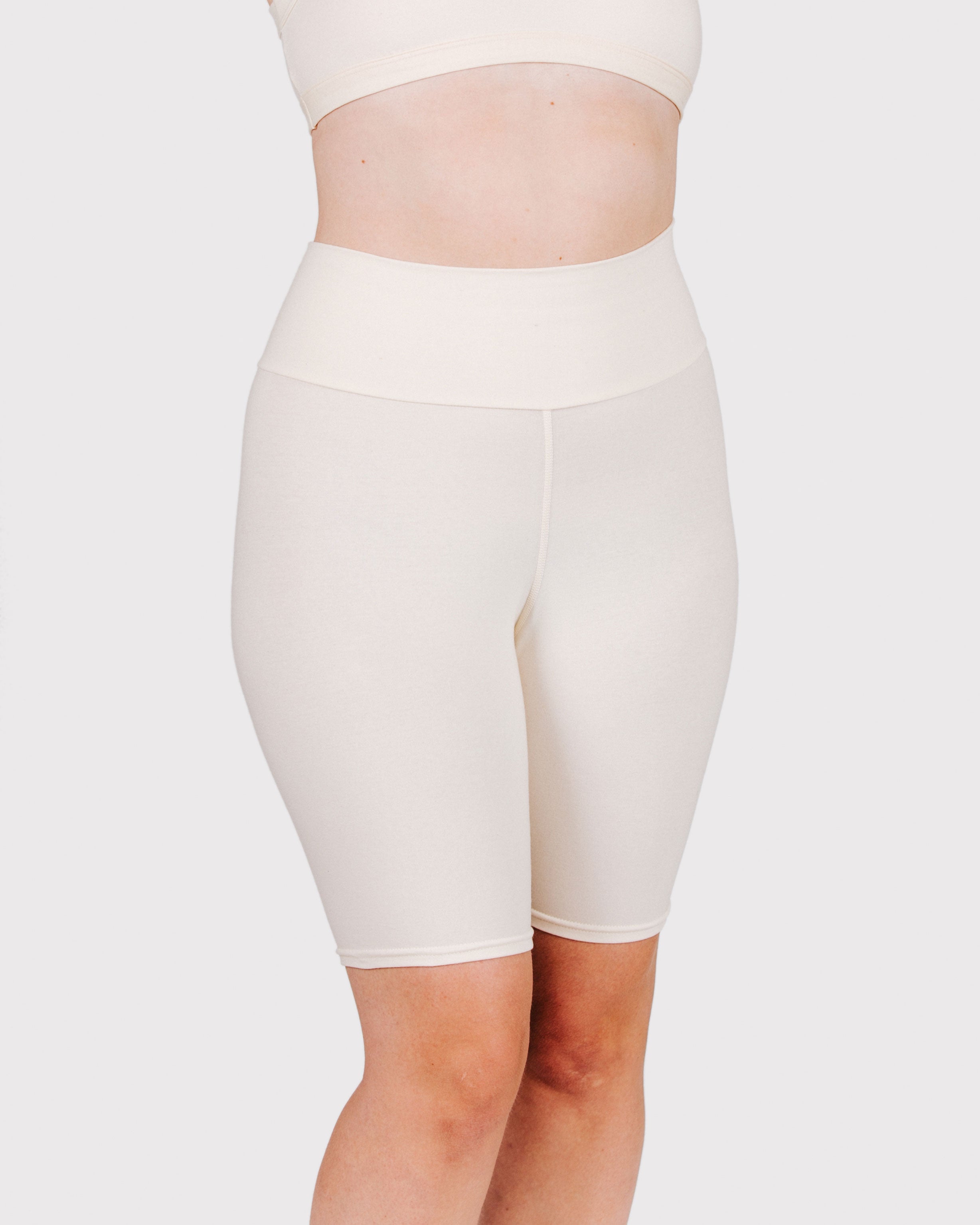 Fit photo from the front of Thunderpants organic cotton Bike Shorts in off-white on a model.
