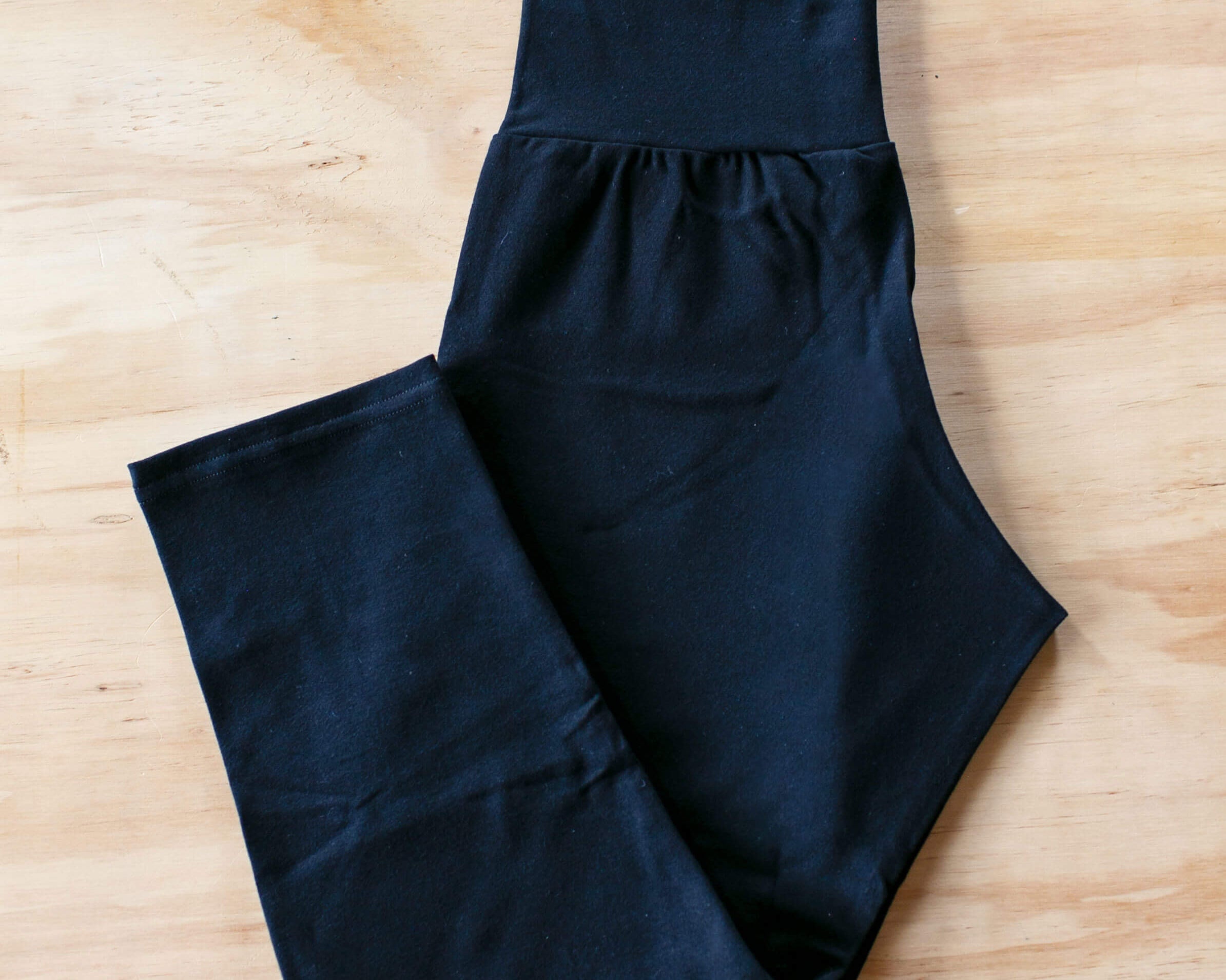 Flat lay of Thunderpants 3/4 Leggings in Plain Black.