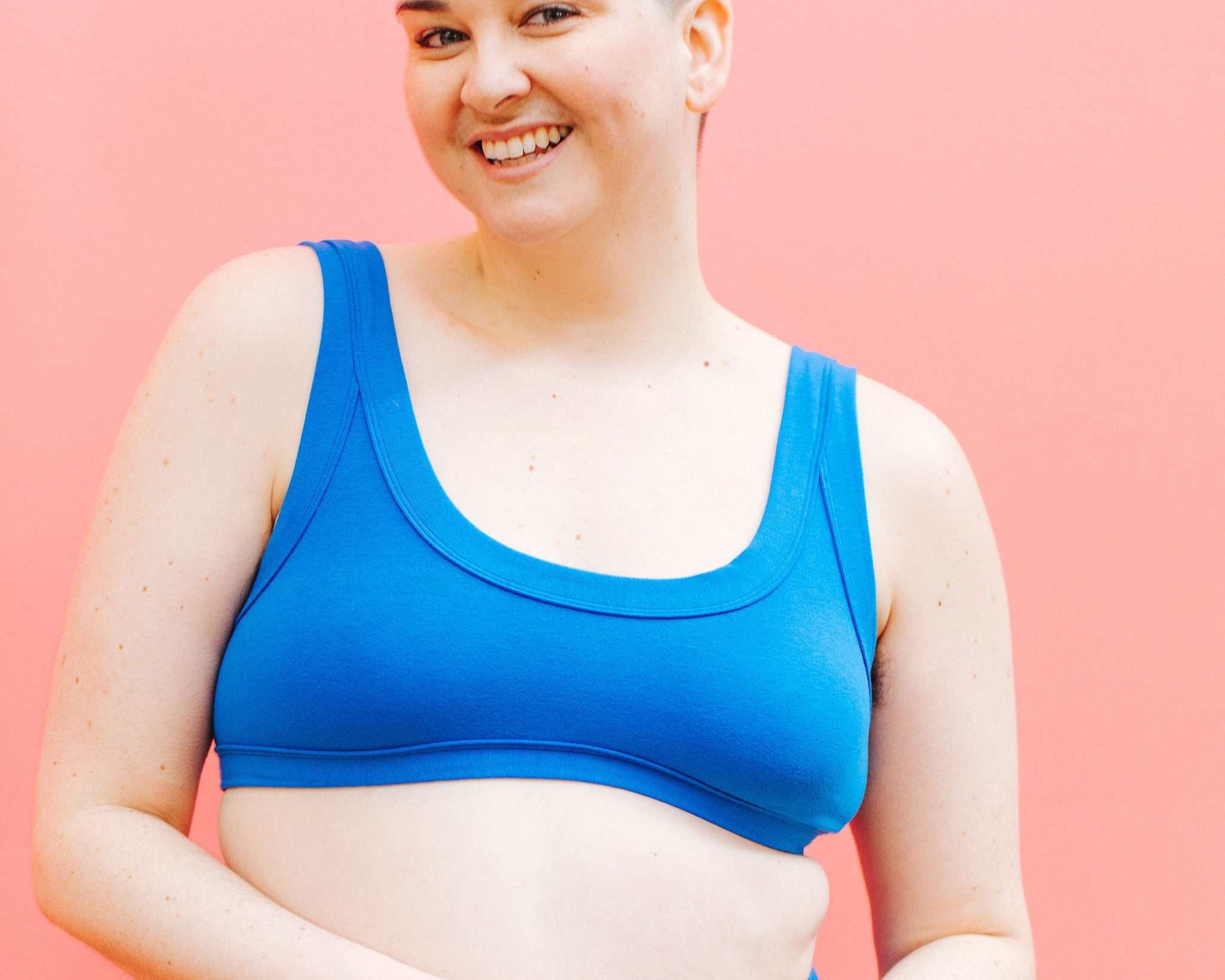 Close up of model wearing Thunderpants Bralette in Blueberry Blue.