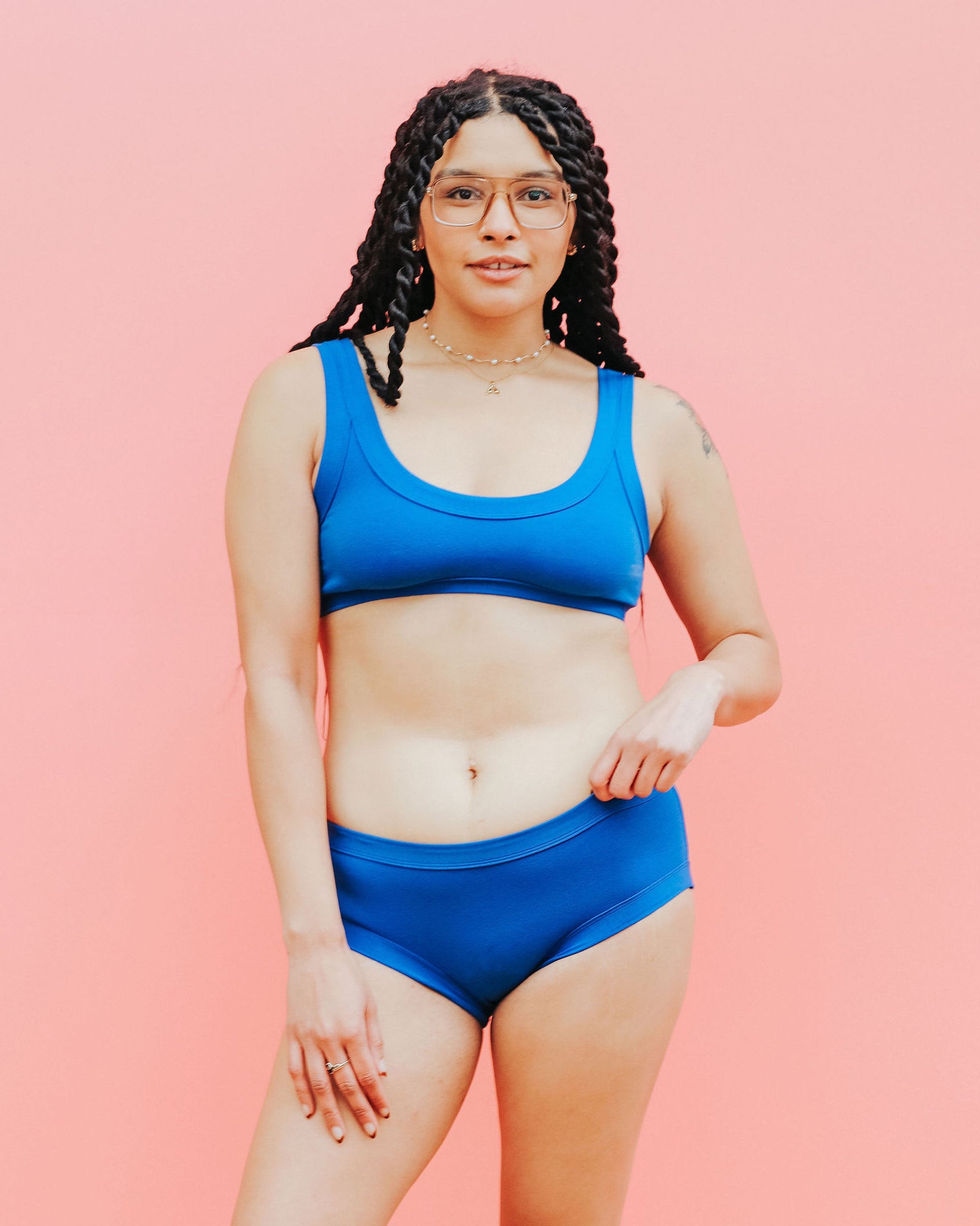 Model wearing Thunderpants Hipster style underwear and Bralette in Blueberry Blue.