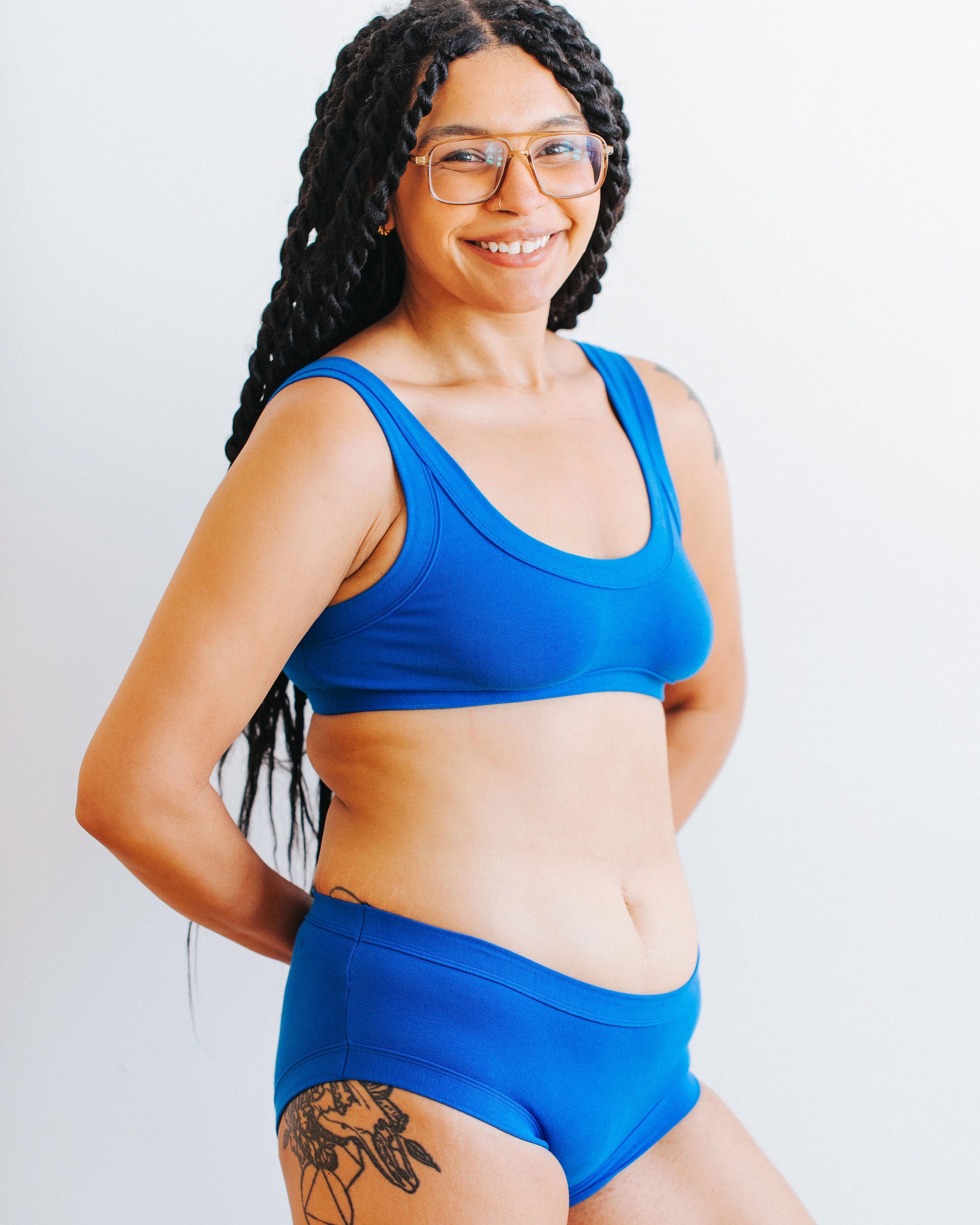 Model wearing Thunderpants Hipster style underwear and Bralette in Blueberry Blue.