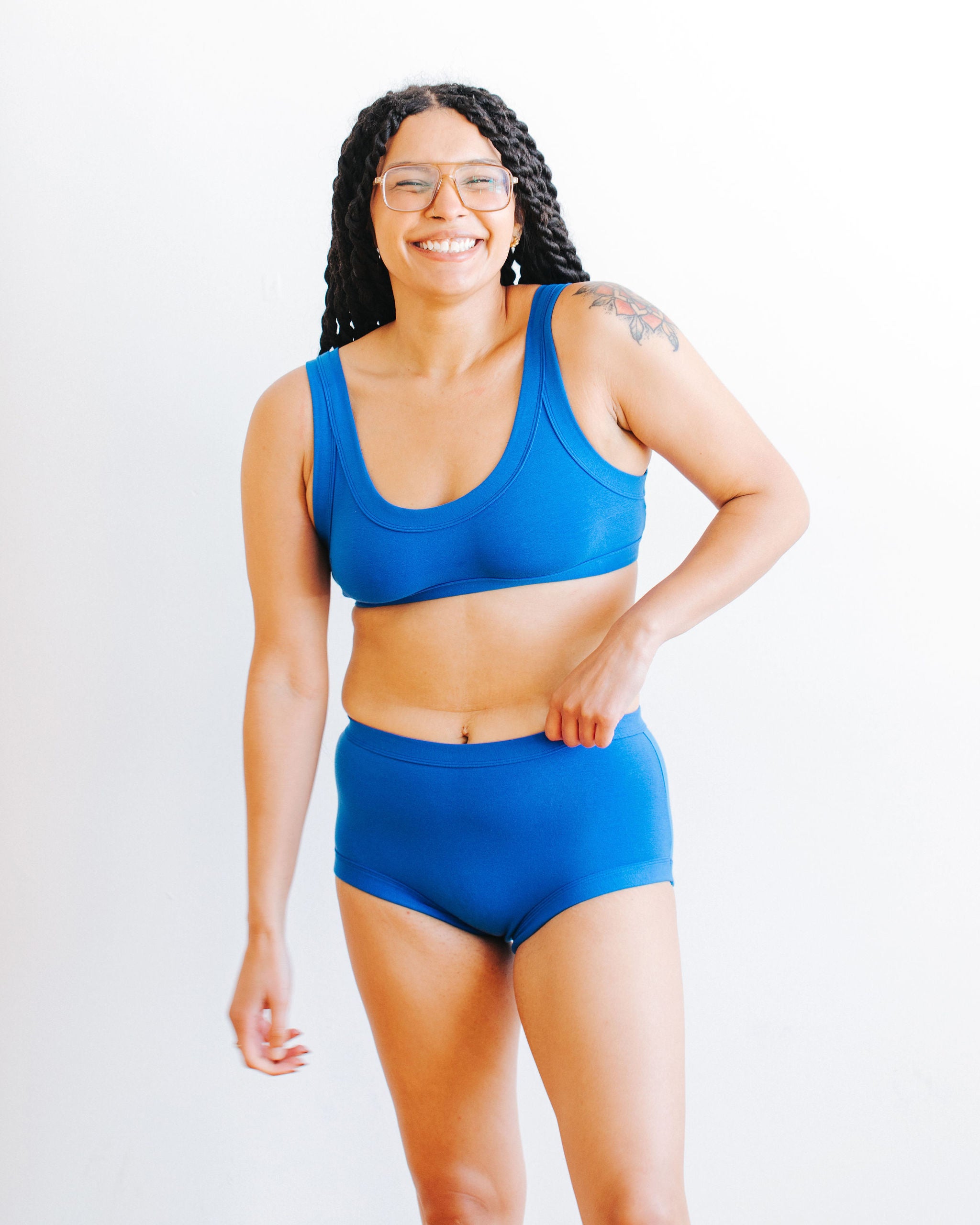 Model wearing Thunderpants Original style underwear and Bralette set in Blueberry Blue.