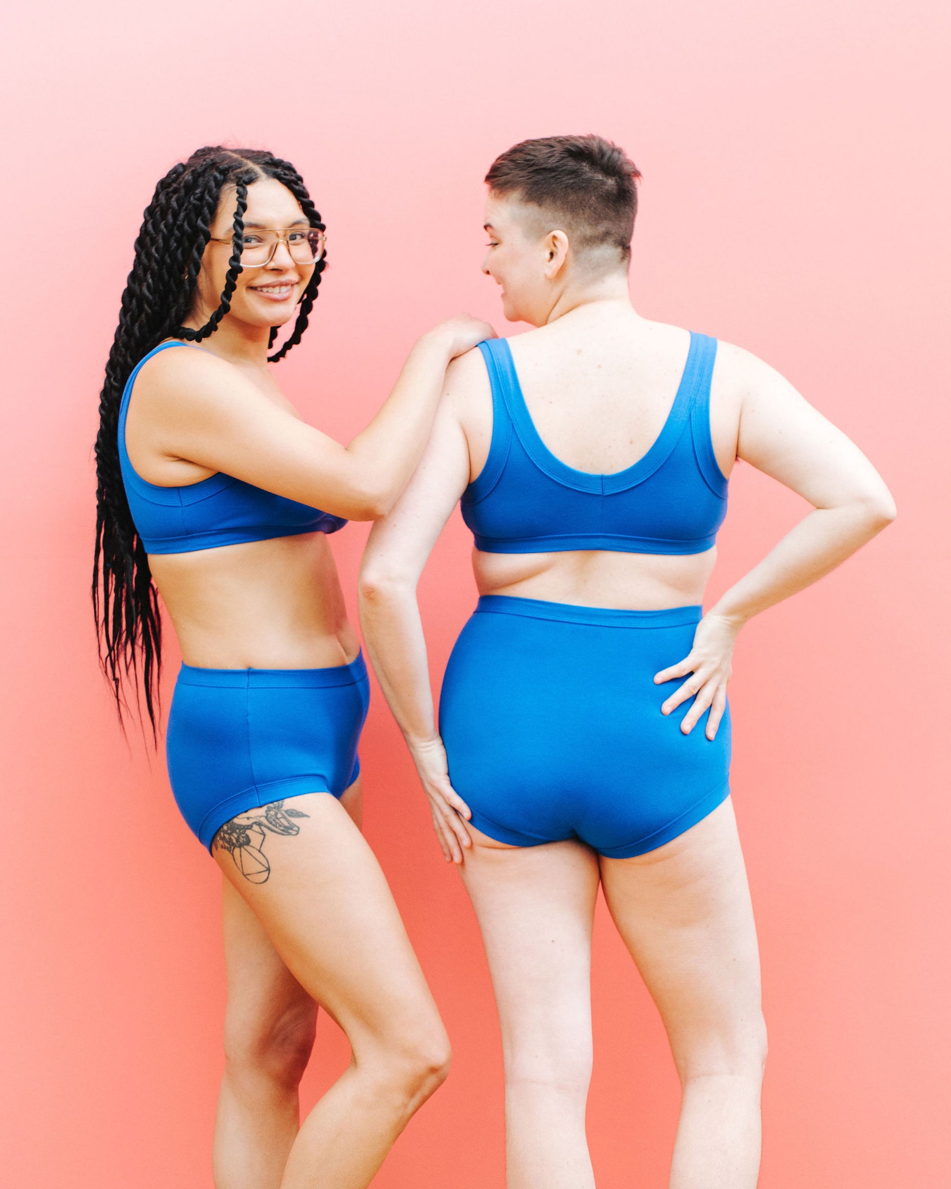 Two models wearing Thunderpants Sky Rise and Hipster style underwear sets in Blueberry Blue.