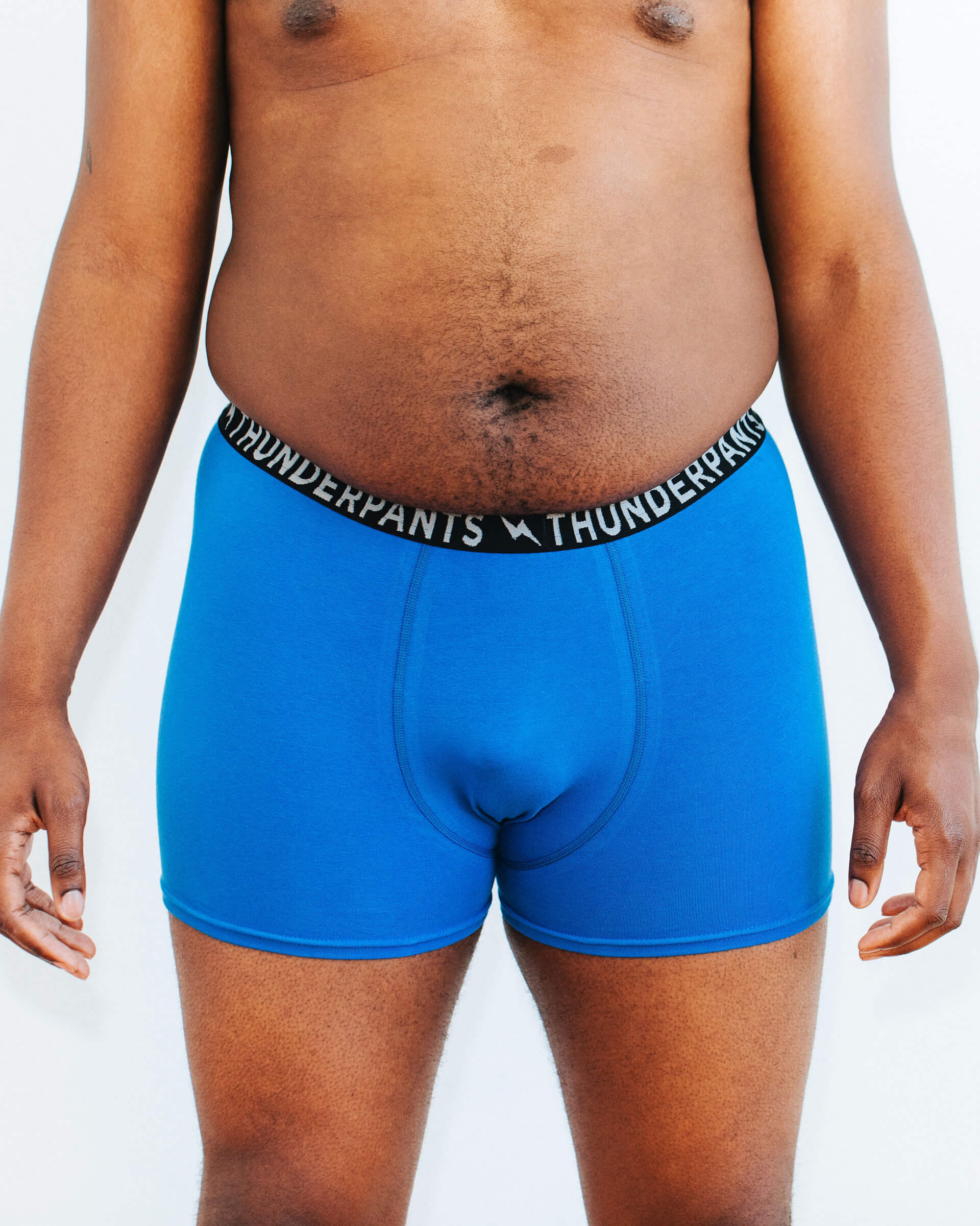 Front photo showing Thunderpants Organic Cotton Boxer Brief style underwear in Blueberry Blue on a model.