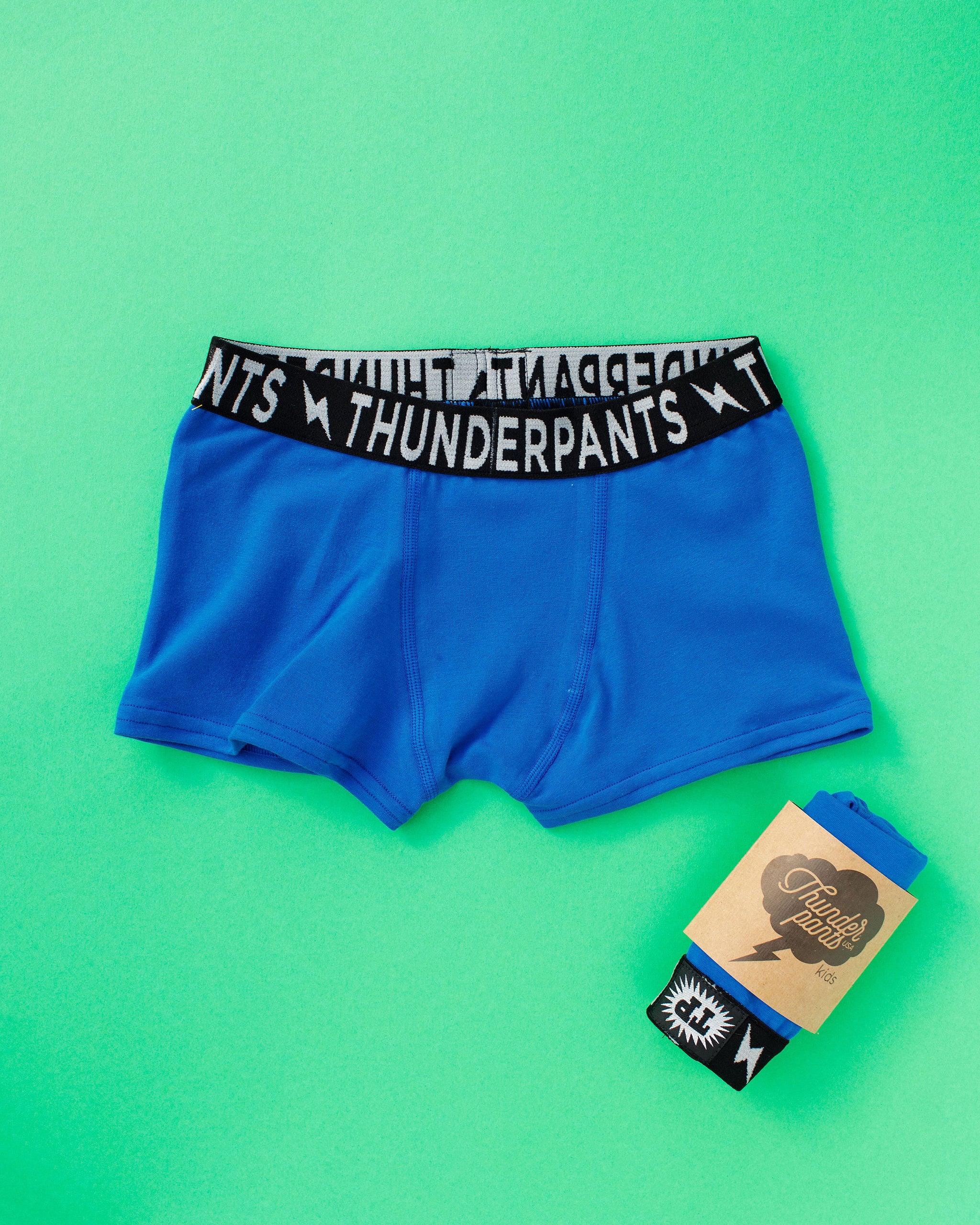 Flat lay of Thunderpants Kid's Boxer Brief style underwear in Blueberry Blue  print.
