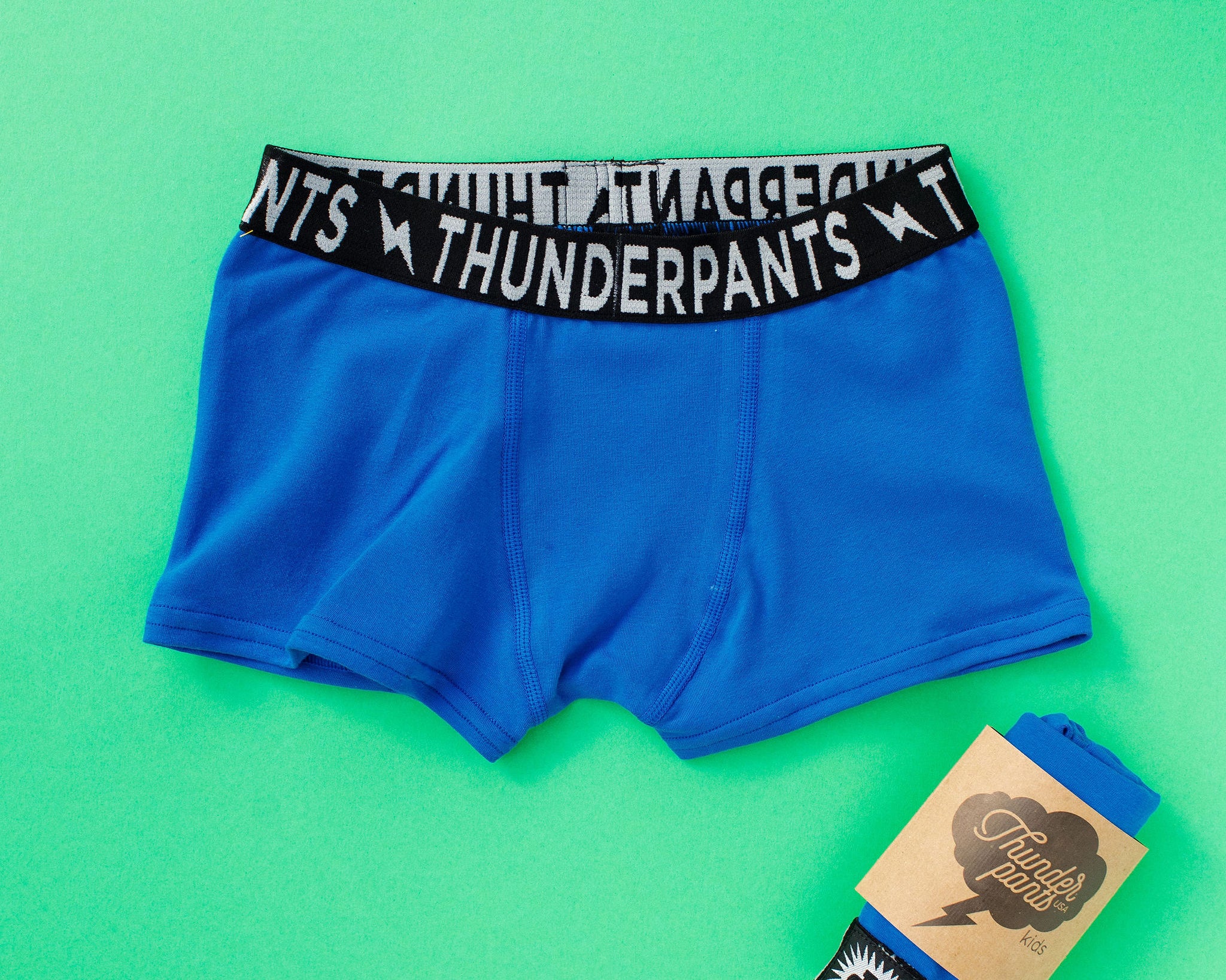 Flat lay of Thunderpants Kid's Boxer Brief style underwear in Blueberry Blue  print.
