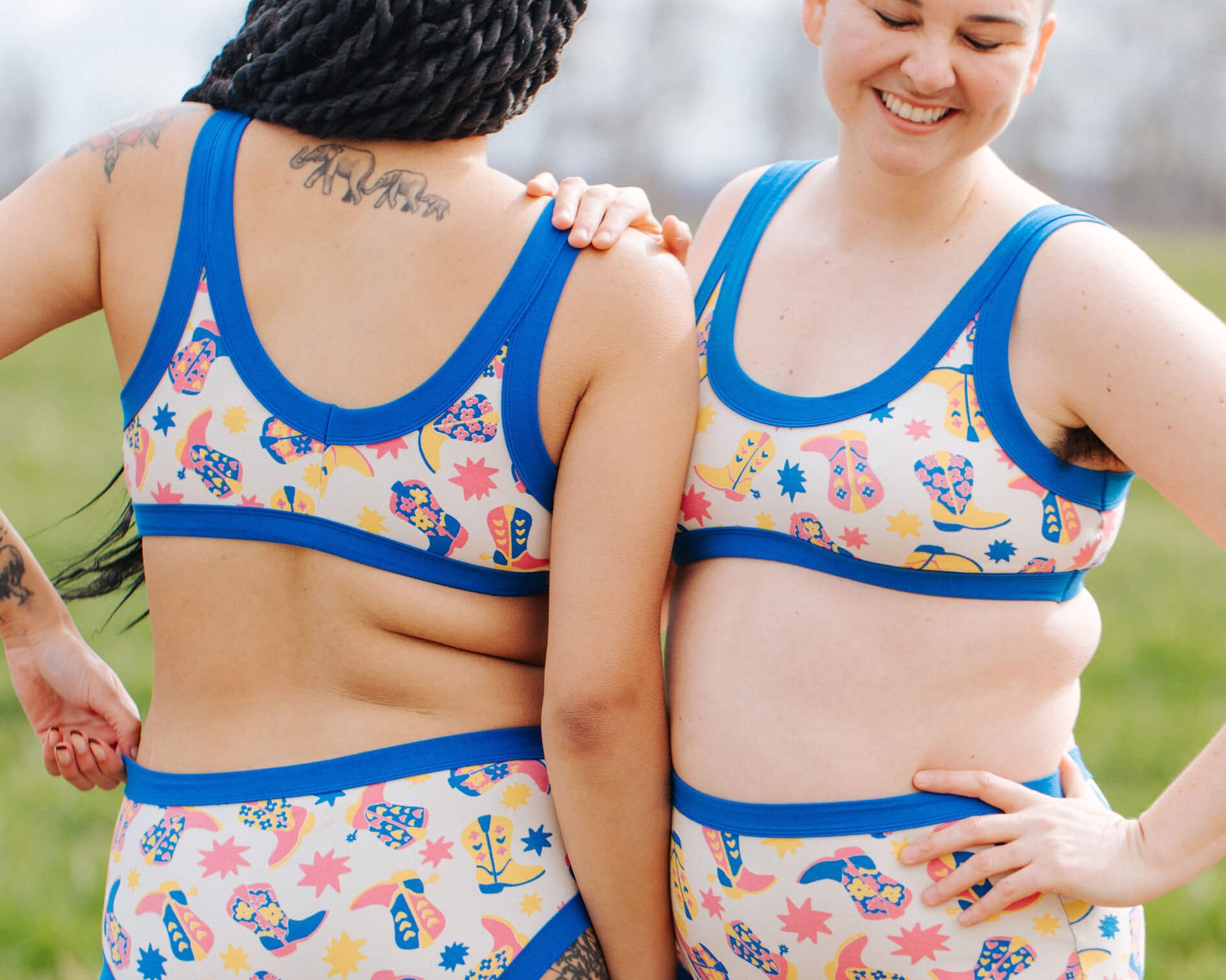 Two models wearing sets in Thunderpants Bralettes and underwear in Boot Scootin' print.