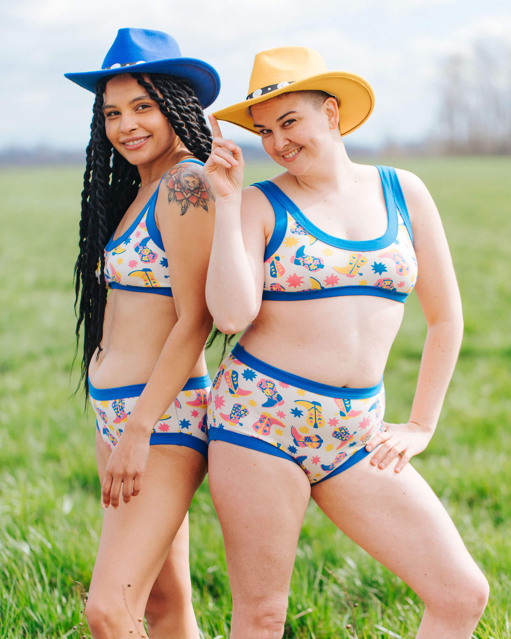 Two models wearing sets of Thunderpants Original style underwear and Bralette in Boot Scootin' print.