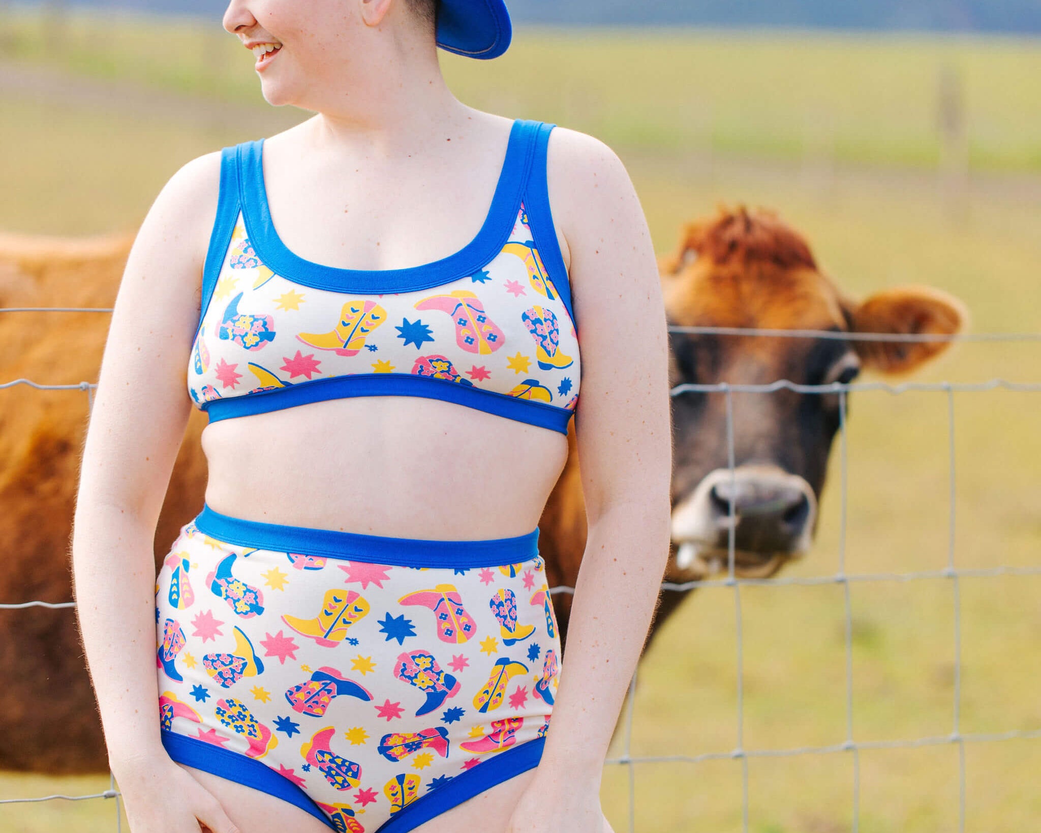 Model wearing a set of Thunderpants Sky Rise style underwear and Bralette in the Boot Scootin' print.