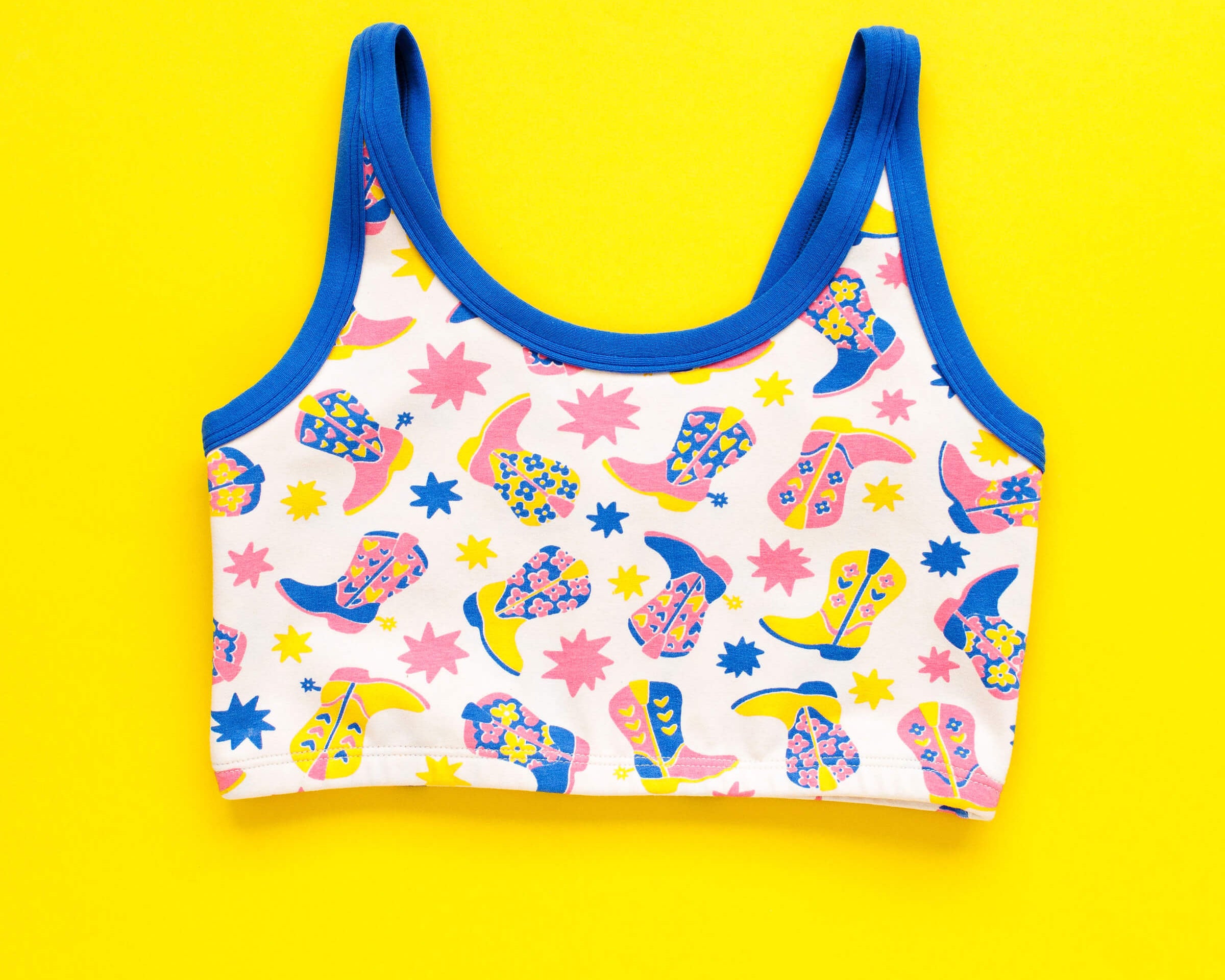 Flat lay of Thunderpants Longline Bra in Boot Scootin' print.