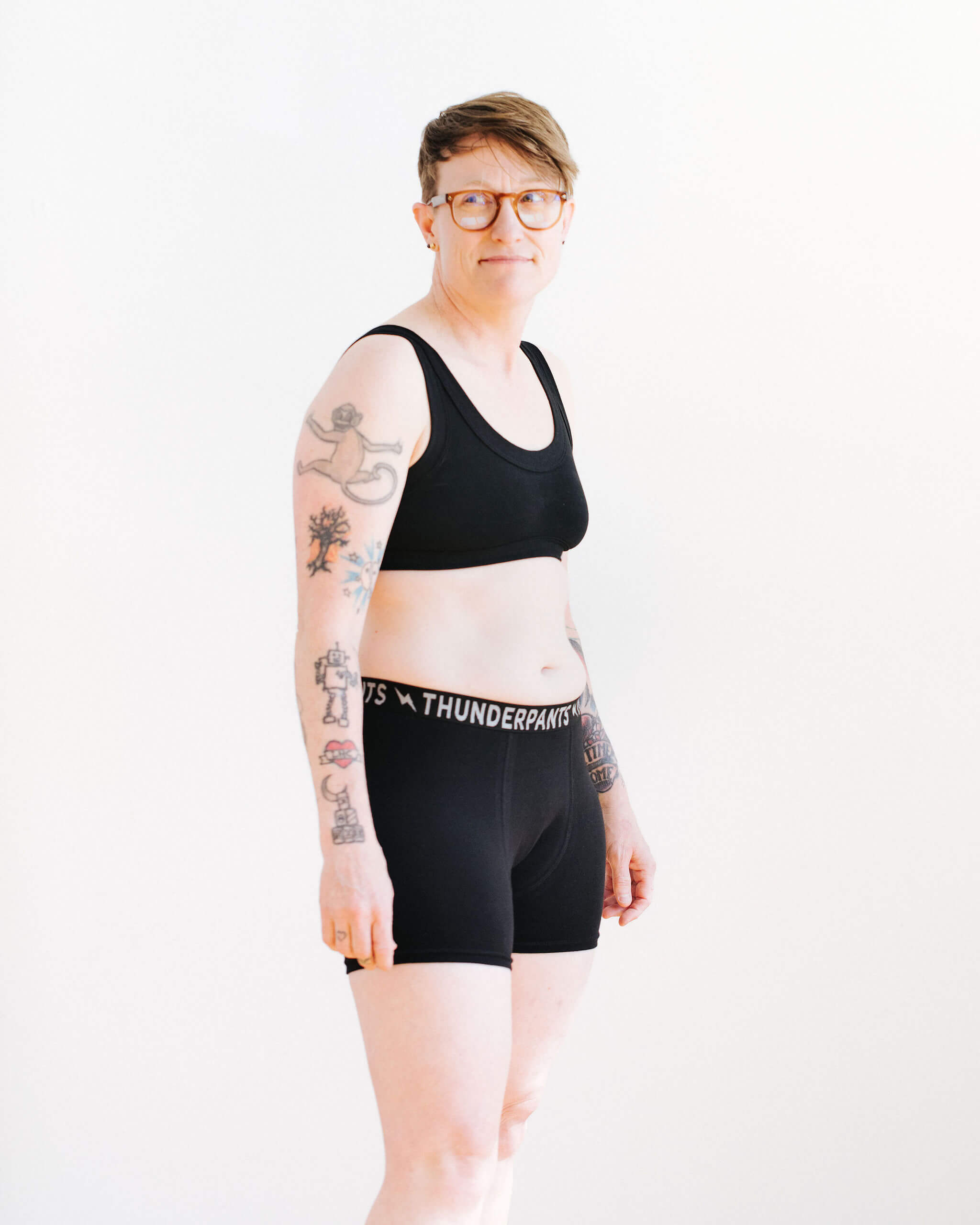 Model wearing Thunderpants Boxer Brief style underwear in Plain Black.