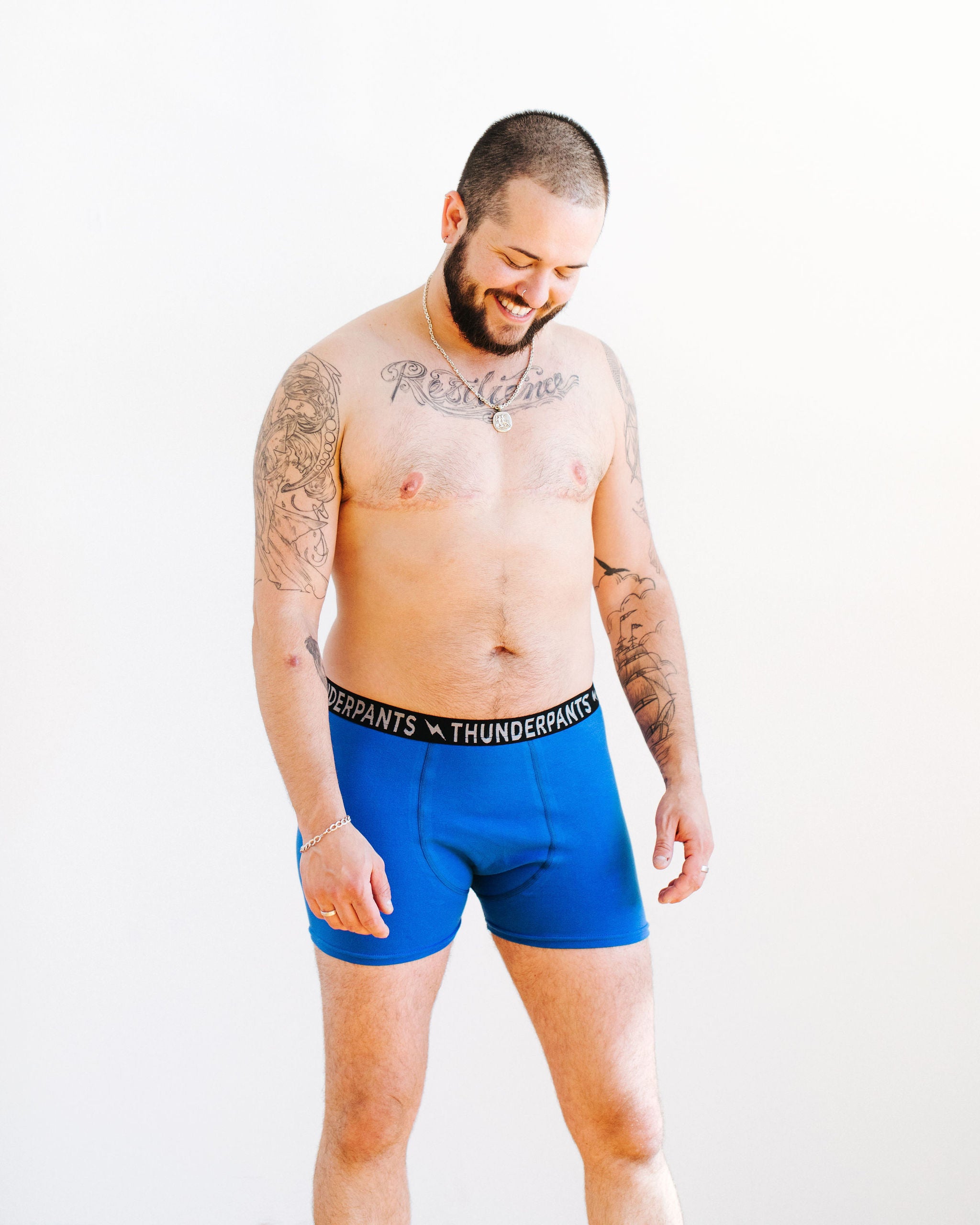 Model wearing Thunderpants Boxer Brief style underwear in Blueberry Blue.