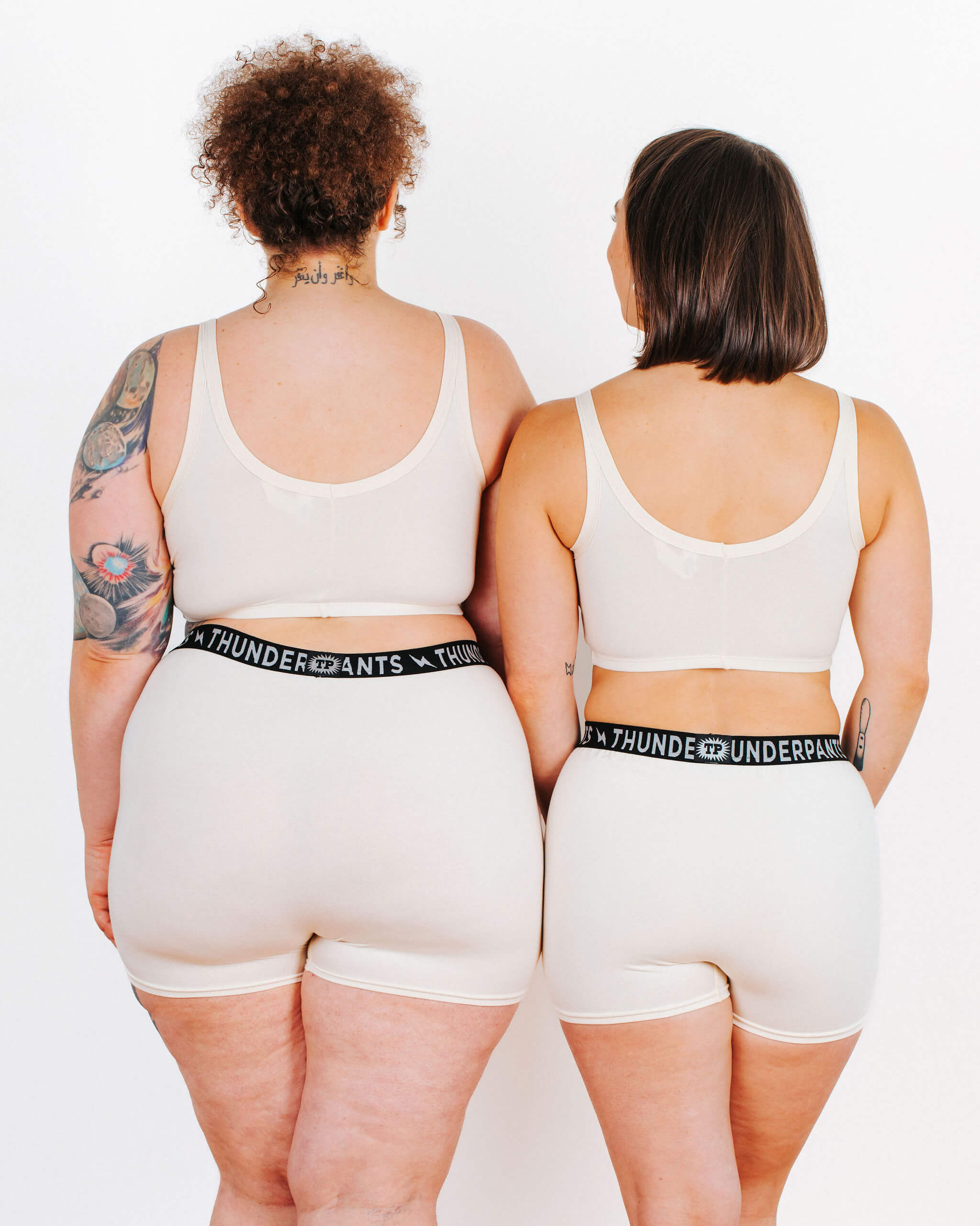 Photo of two models from the back in Thunderpants organic cotton Boxer Brief underwear style in Plain Vanilla. 