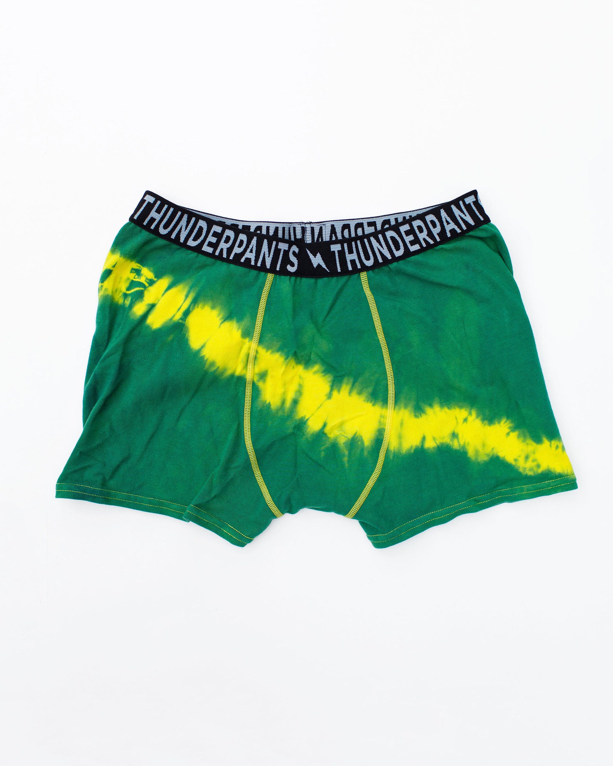 Flat lay of Thunderpants Boxer Brief style underwear in Lightning Bolt hand dye - green/blue with yellow stripe.