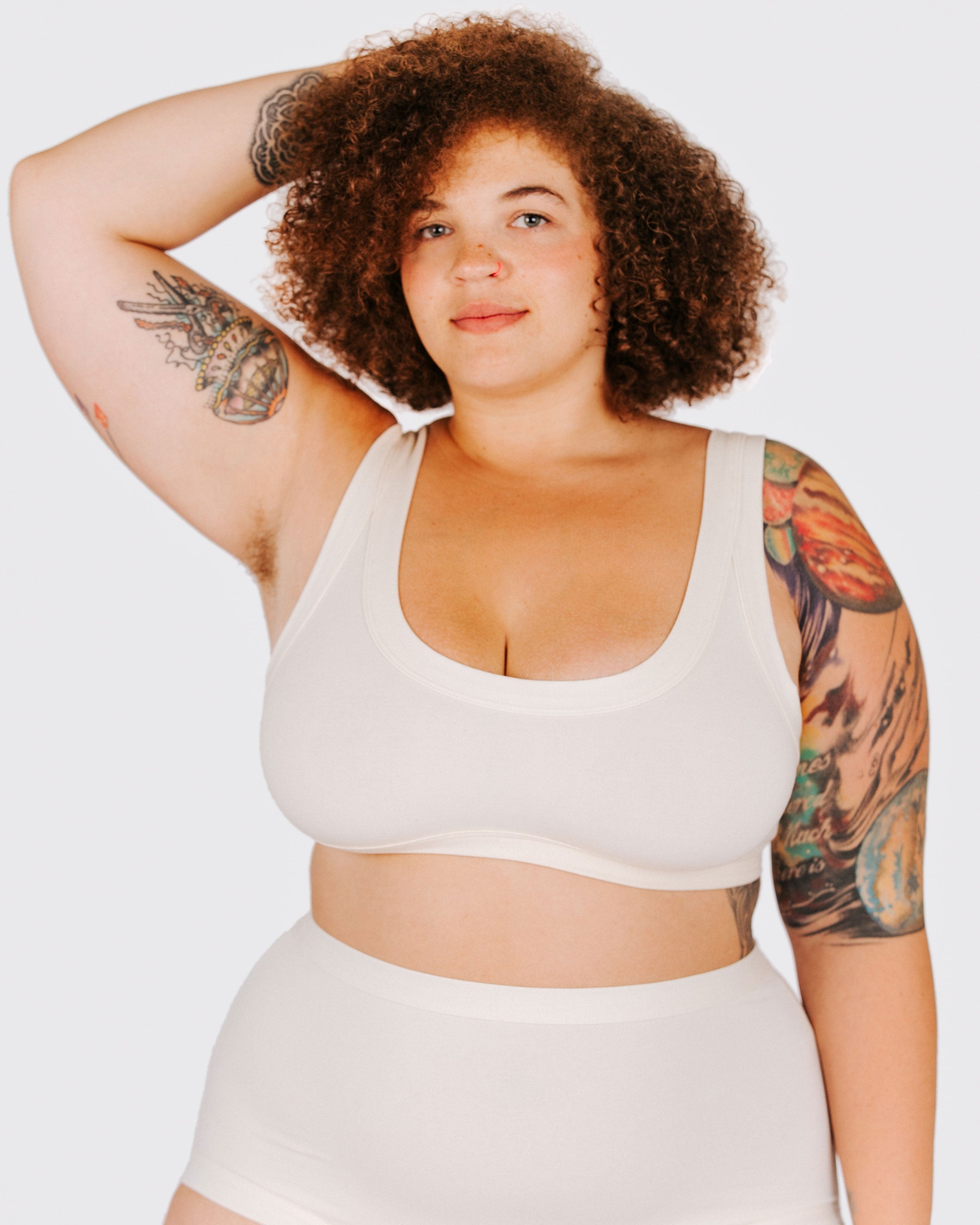 Fit photo from the front of Thunderpants organic cotton Bralette and Original Style underwear in off-white on a model.