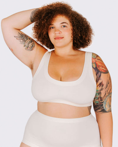 Fit photo from the front of Thunderpants organic cotton Bralette and Original Style underwear in off-white on a model.