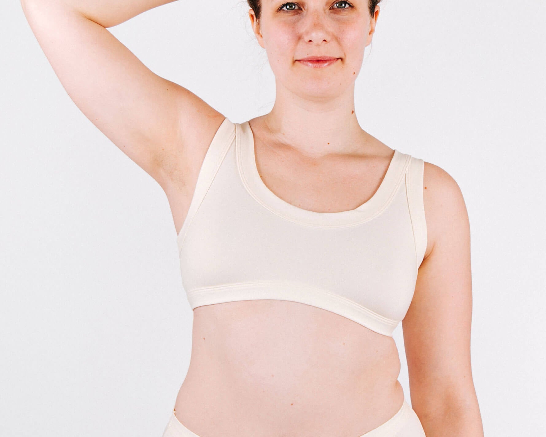 Fit photo from the front of Thunderpants organic cotton Bralette and Original Style underwear in off-white on a model.