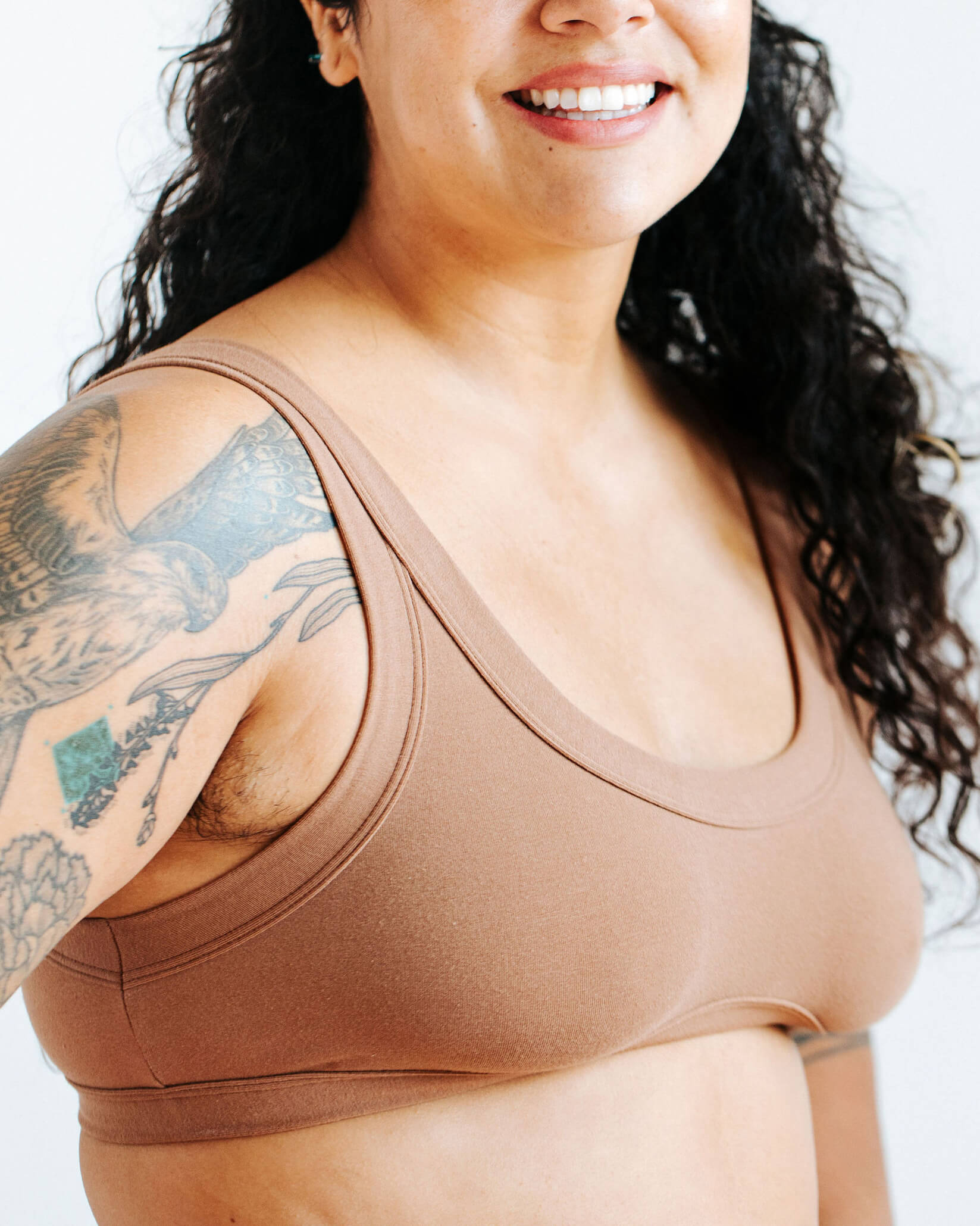 Close up of model wearing Thunderpants Bralette in Hazelnut color.