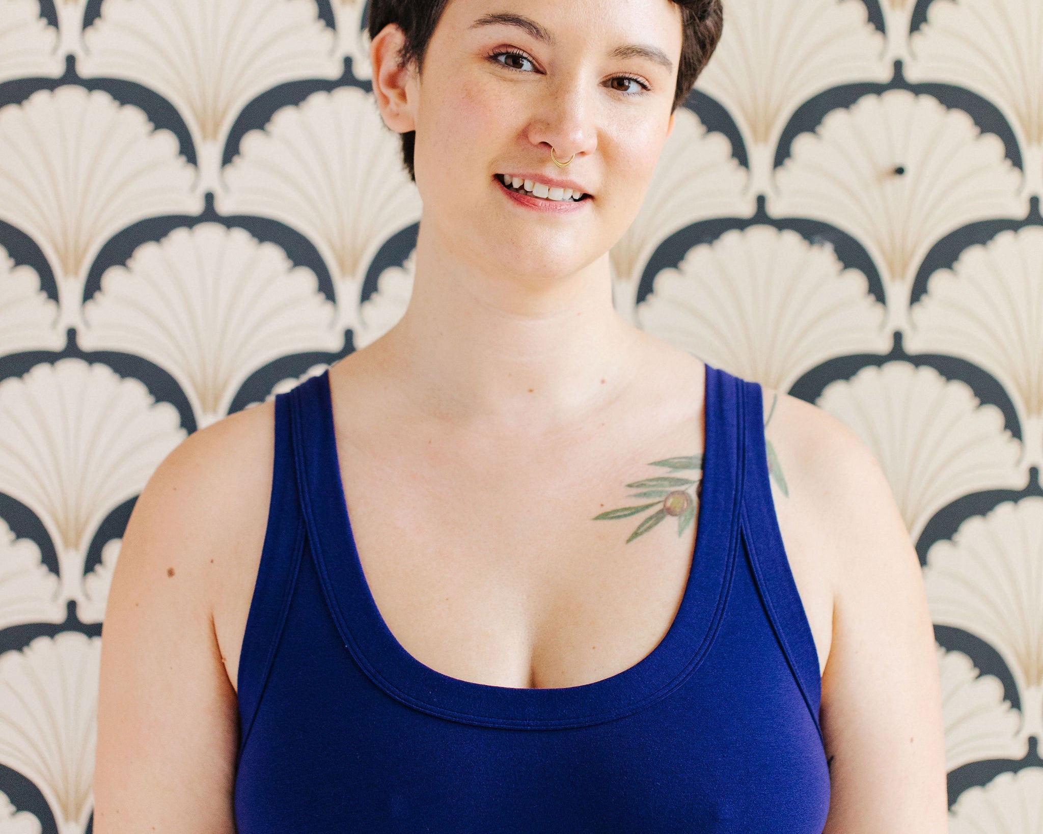 Model wearing Thunderpants Bralette in Indigo blue.