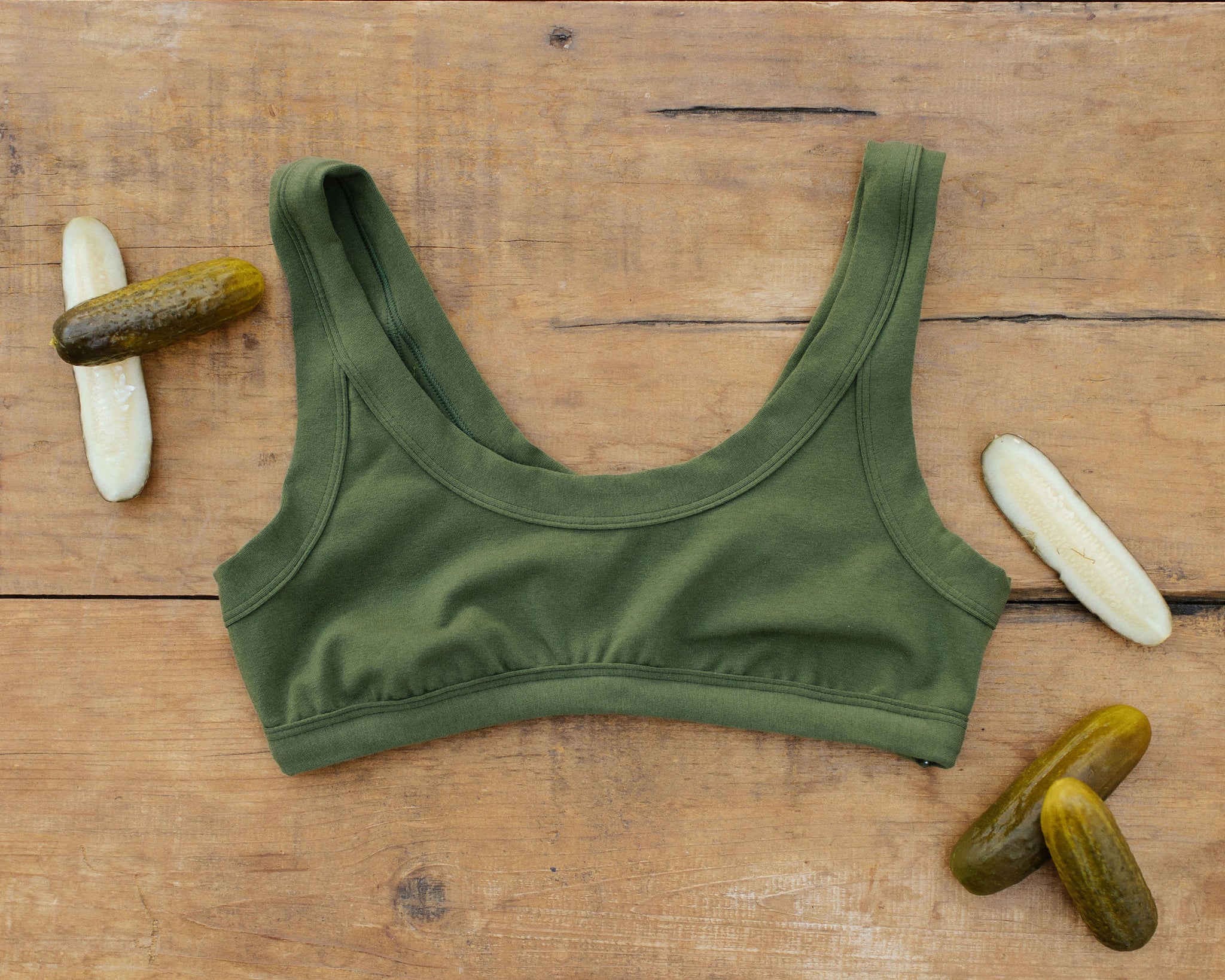 Flat lay of Thunderpants Bralette in Pickled Green.
