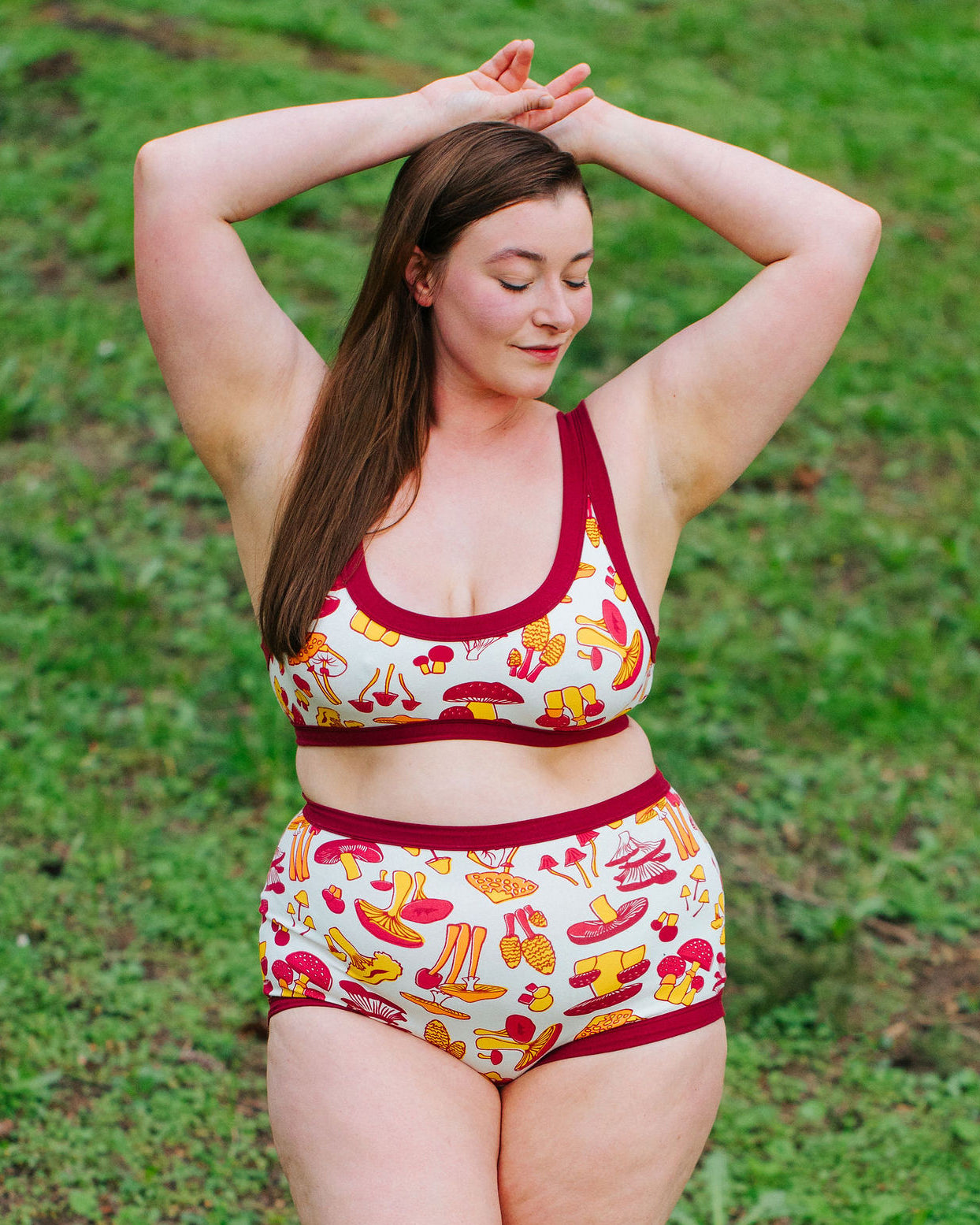 Model wearing Thunderpants Bralette and Sky Rise style underwear in Whadda Fungi print - red, yellow, and orange mushroom print.