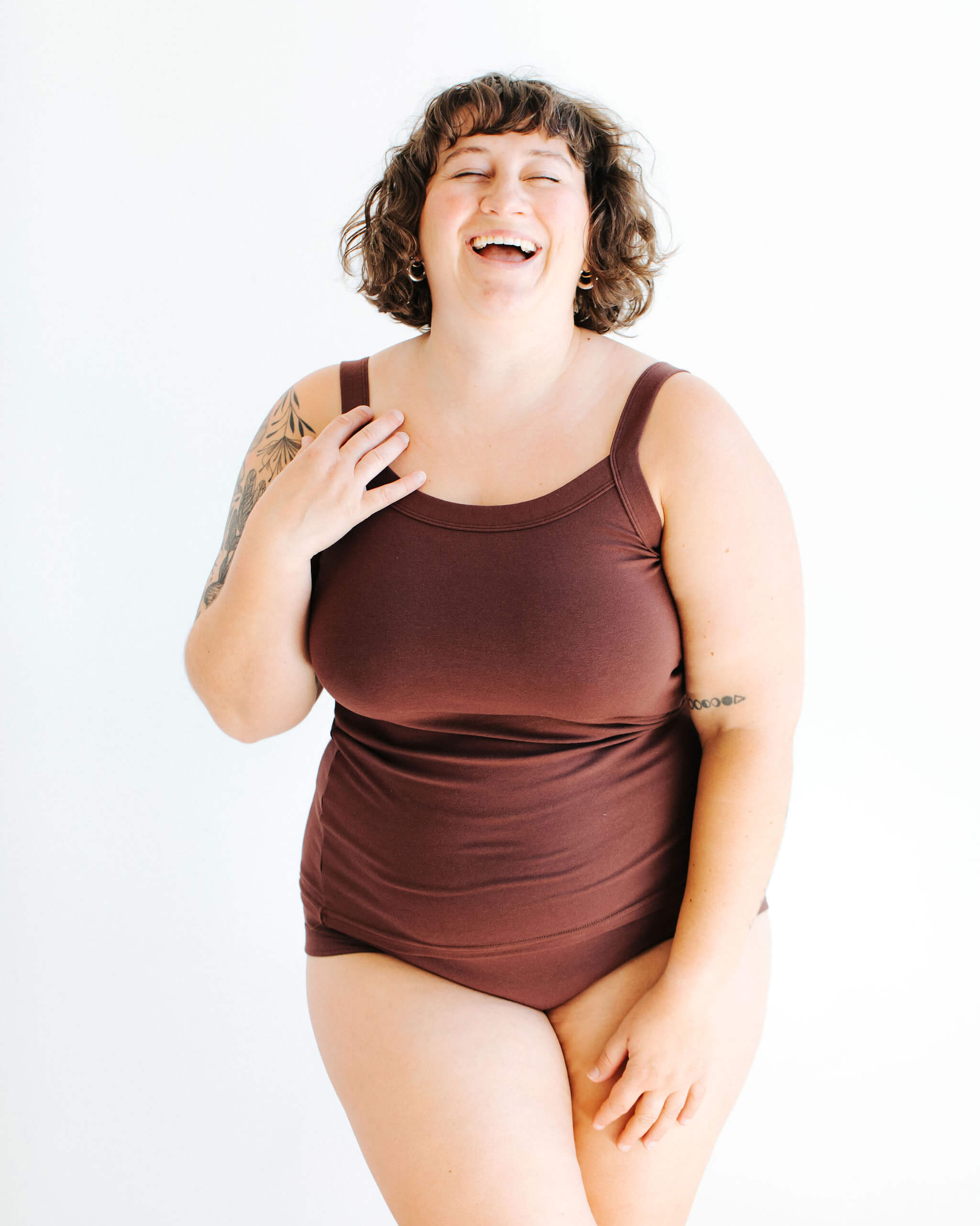 Model wearing Thunderpants Camisole and underwear in Chestnut - a dark brown color.