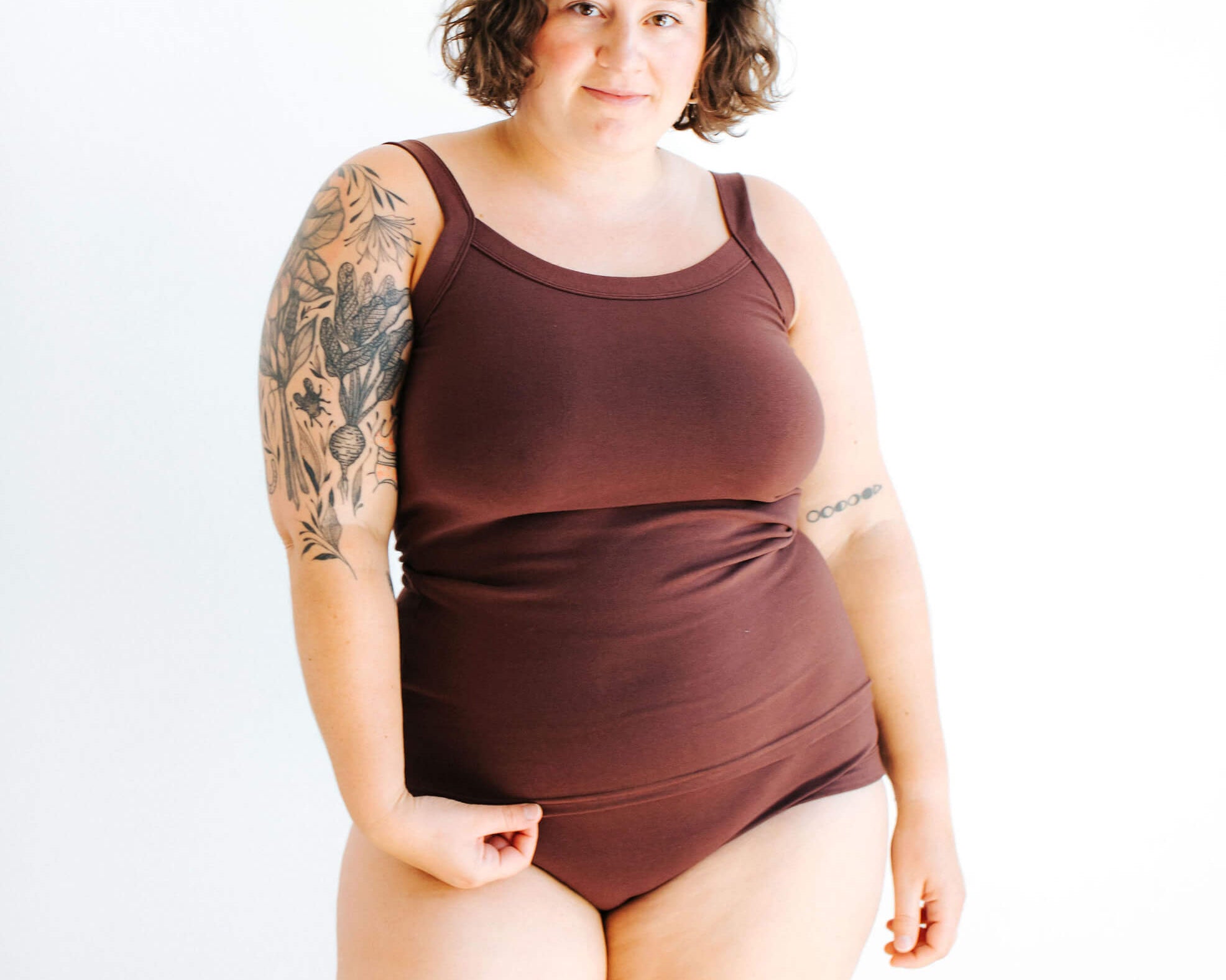 Model wearing Thunderpants Camisole and underwear in Chestnut - a dark brown color.